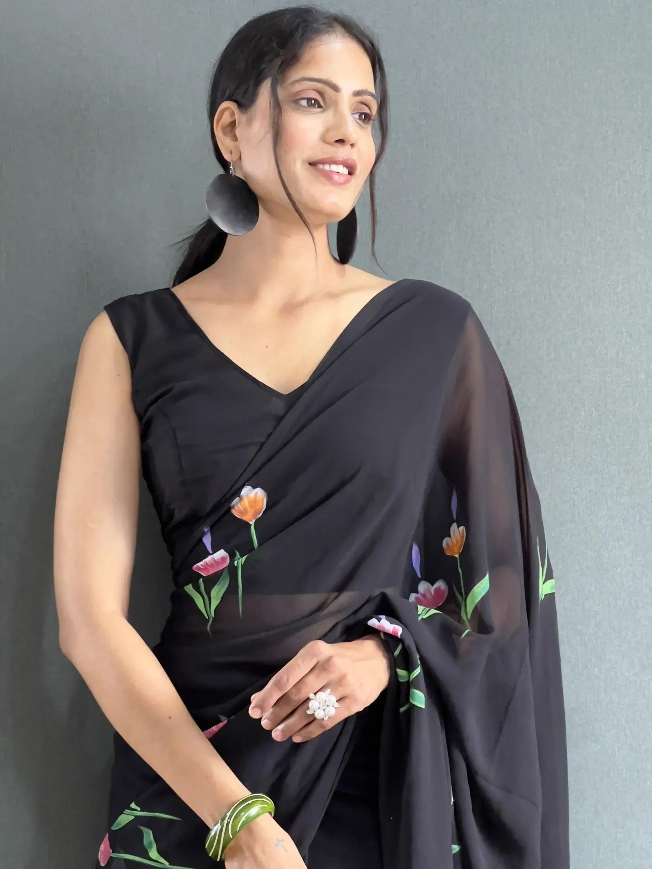 Black floral print saree with V-neck blouse, ethnic Indian wear for women