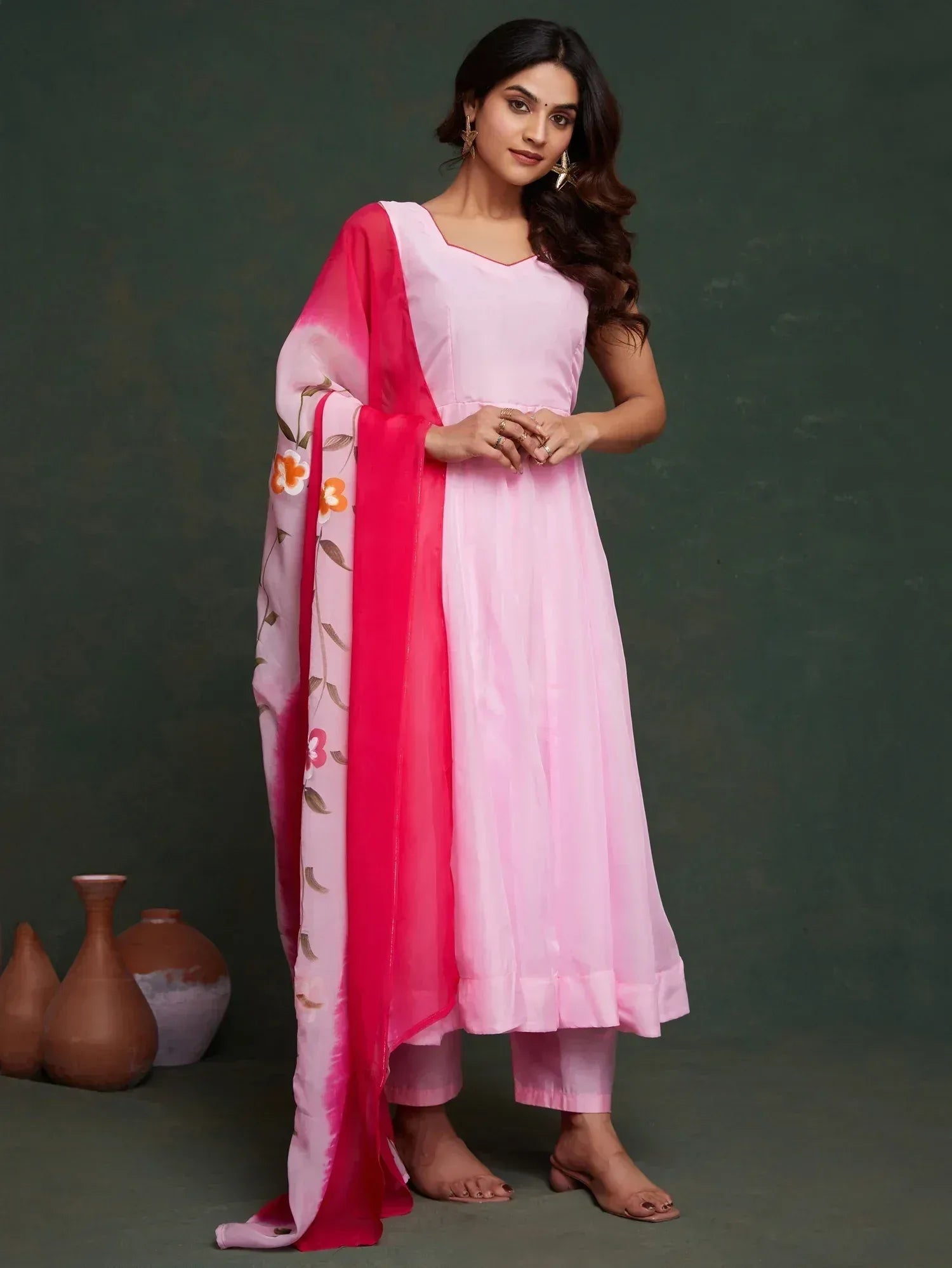Pink ethnic kurta set with floral dupatta, perfect for Indian occasions and festive wear.
