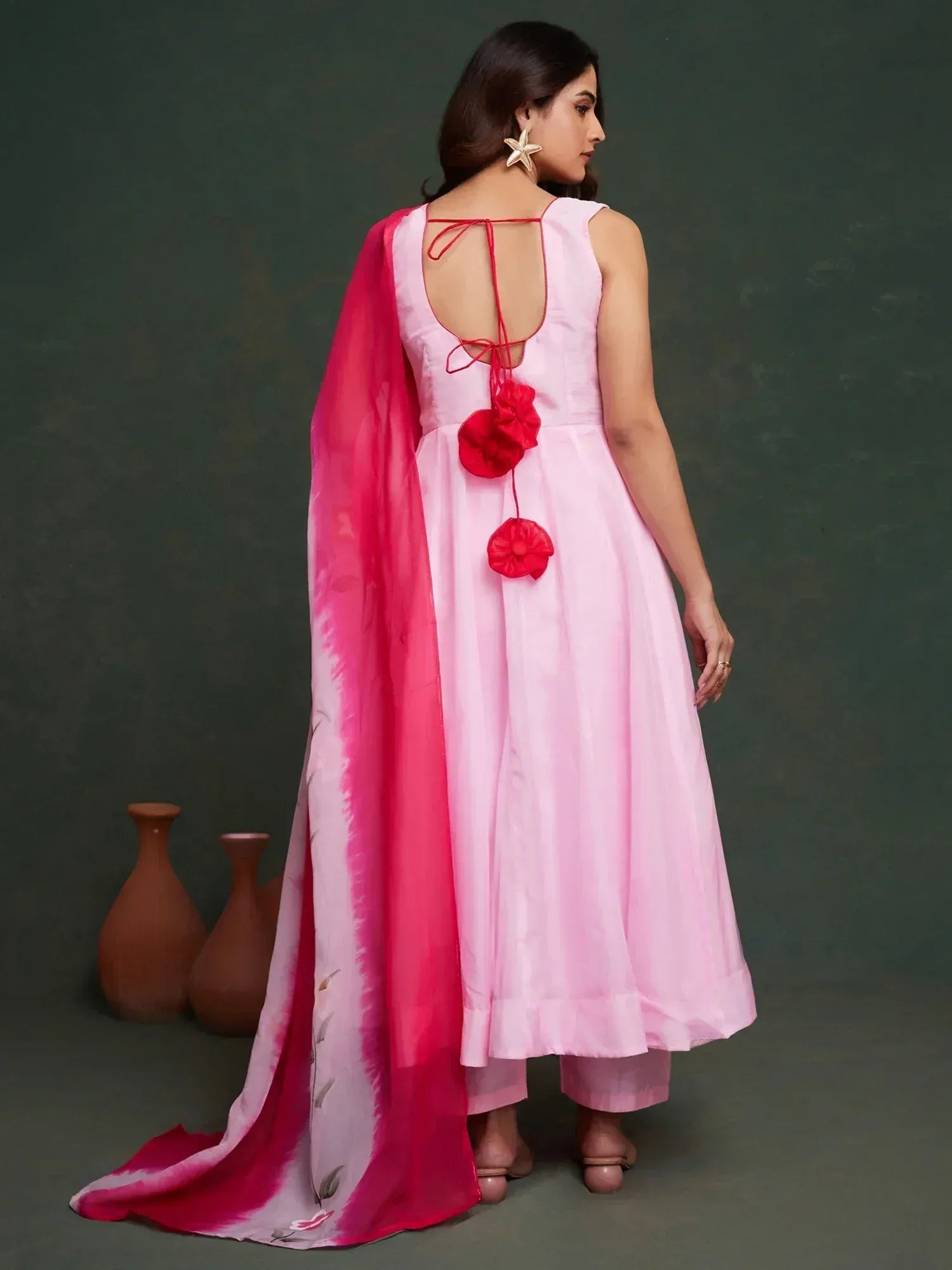 Pink ethnic gown with red floral back ties and matching dupatta, stylish Indian wear