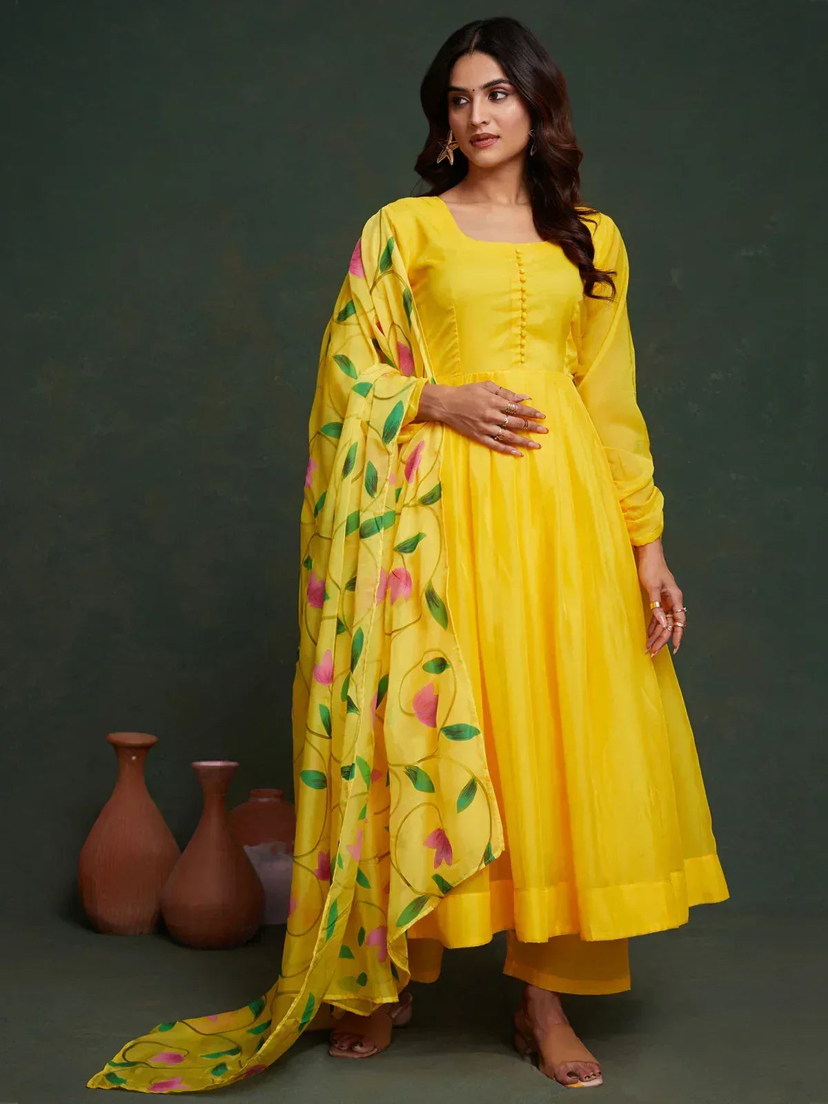 Yellow ethnic anarkali suit with floral dupatta, perfect for Indian occasions and festive wear.