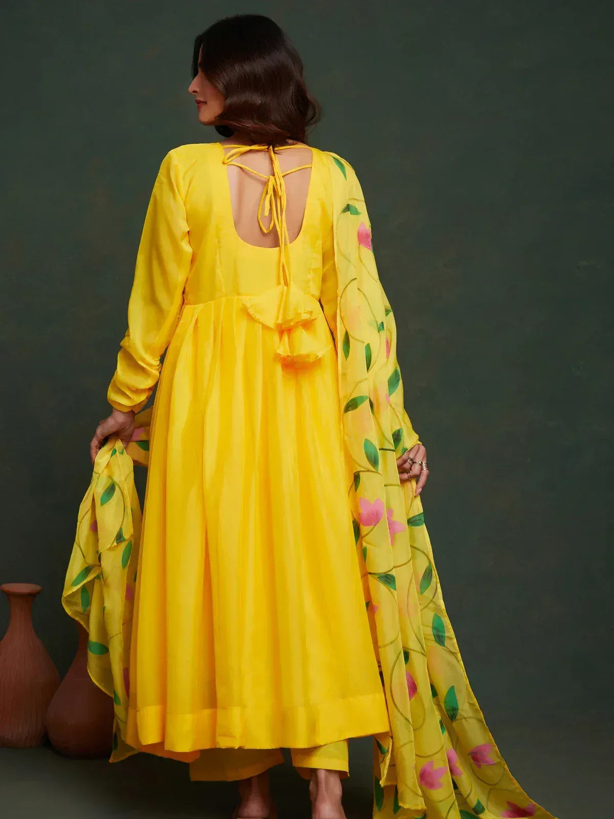 Yellow floral print ethnic gown with back tie detail, paired with matching dupatta for Indian wear