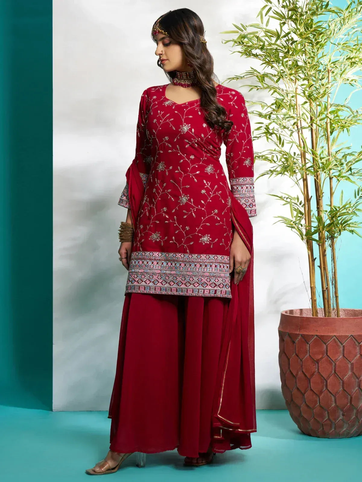 Red embroidered salwar kameez with floral detailing and dupatta, ethnic Indian wear for women