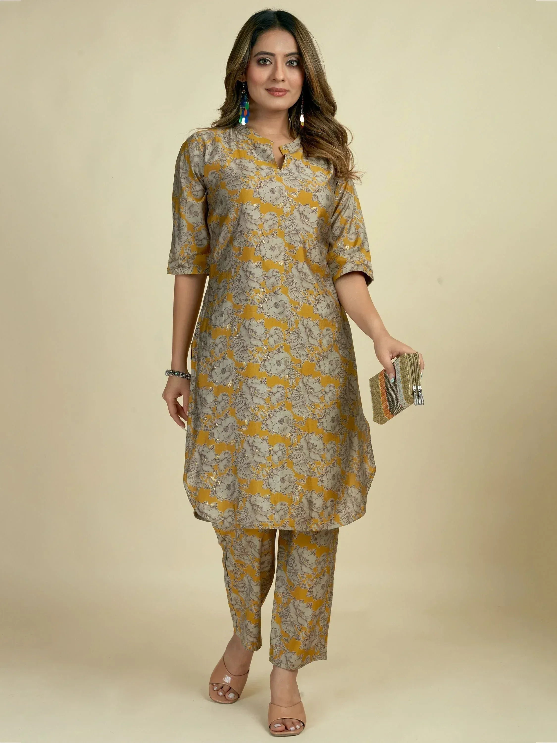 Yellow floral print salwar kameez with matching pants, perfect for ethnic wear occasions