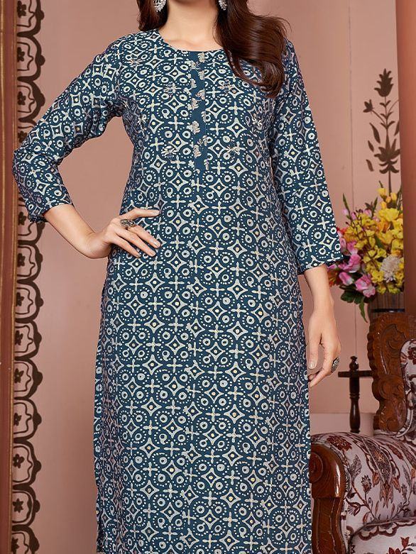 Woman in blue printed ethnic kurti with geometric patterns, three-quarter sleeves