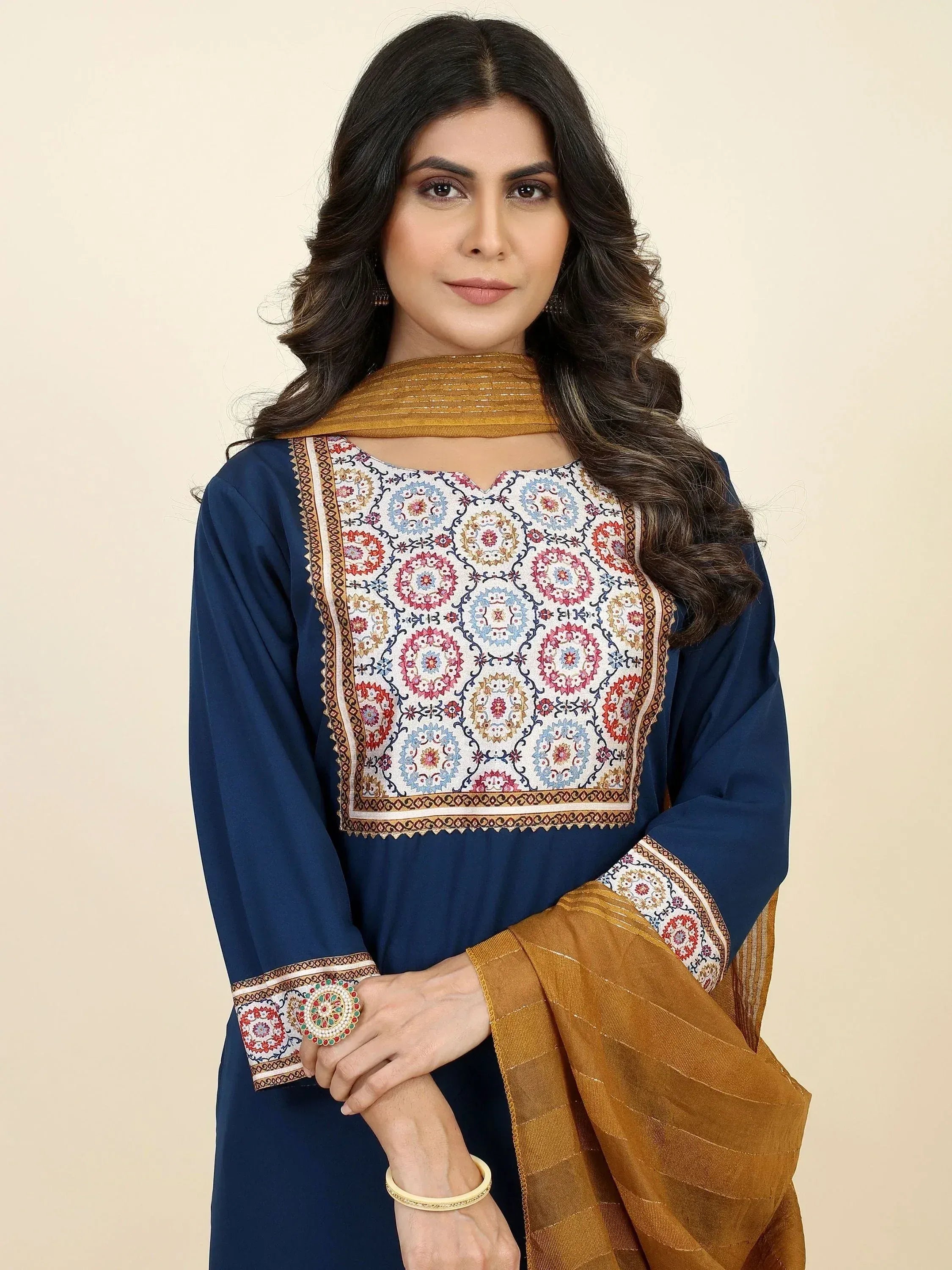 Blue embroidered ethnic kurti with floral patterns and golden dupatta