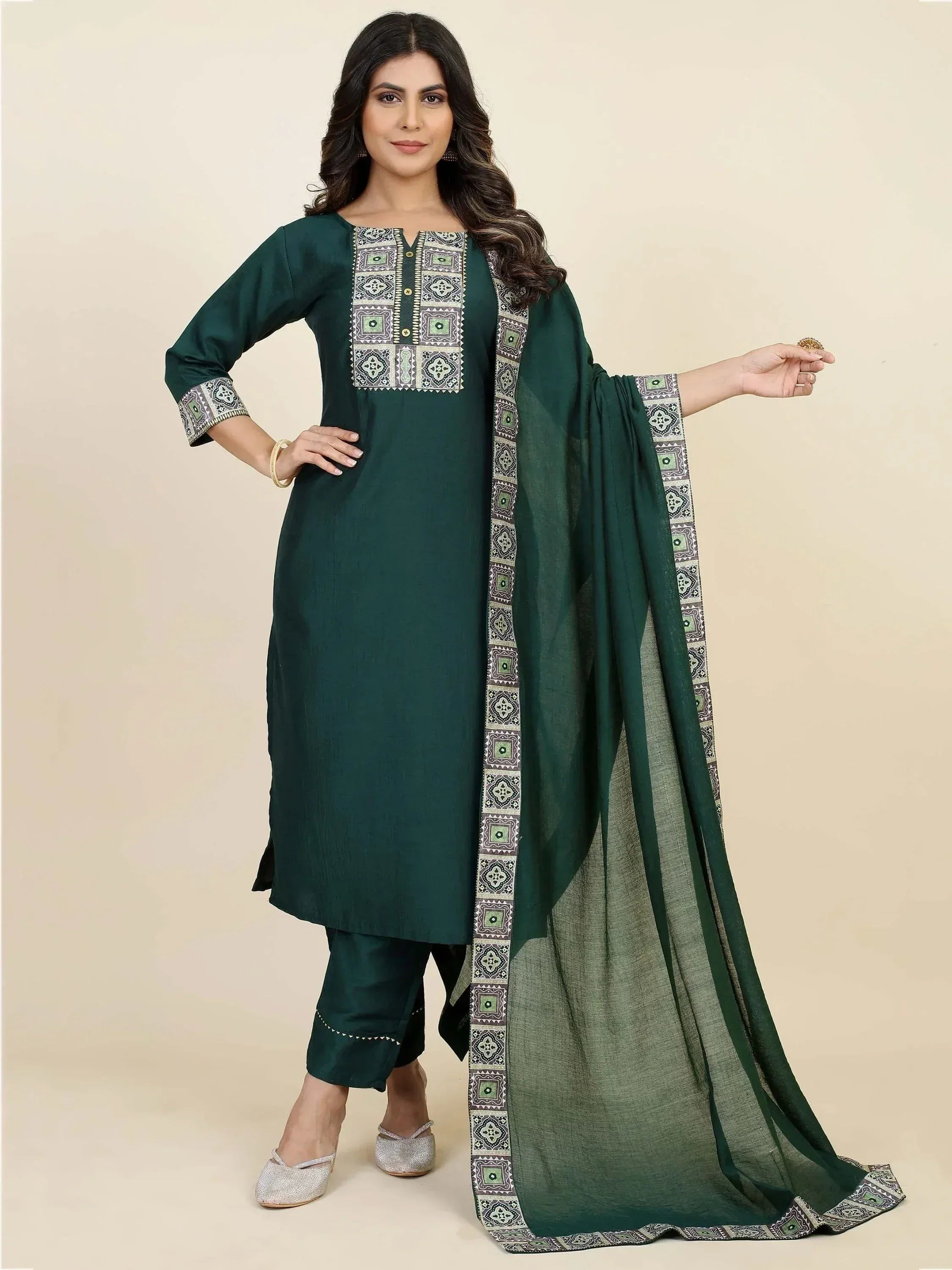 Emerald green ethnic salwar kameez with printed dupatta, perfect for Indian occasions and festive wear.