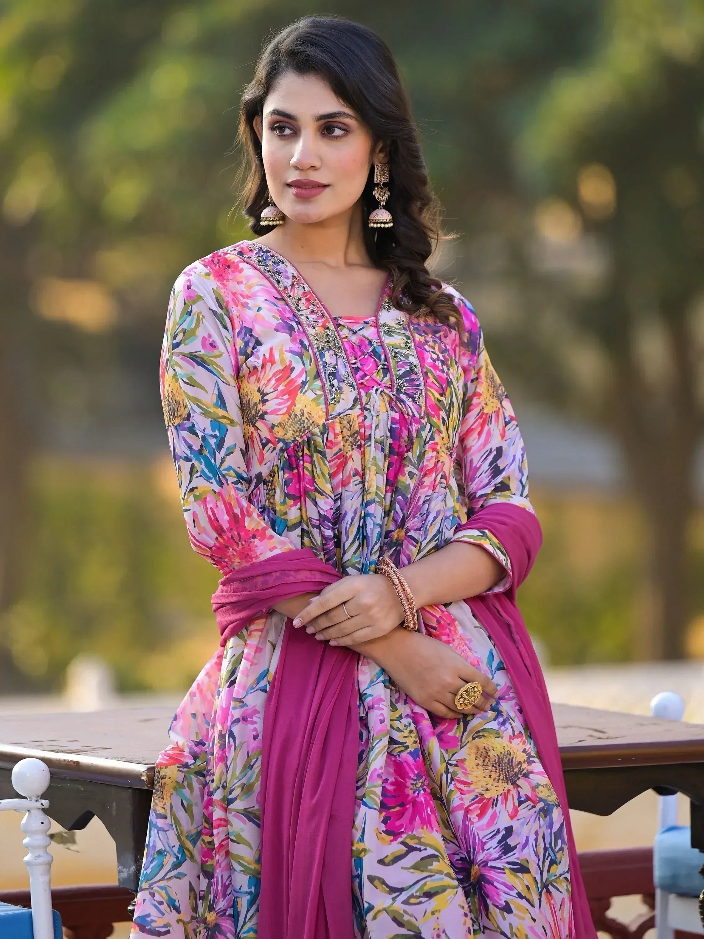 Floral print ethnic gown with pink dupatta, perfect for Indian occasions and festive wear