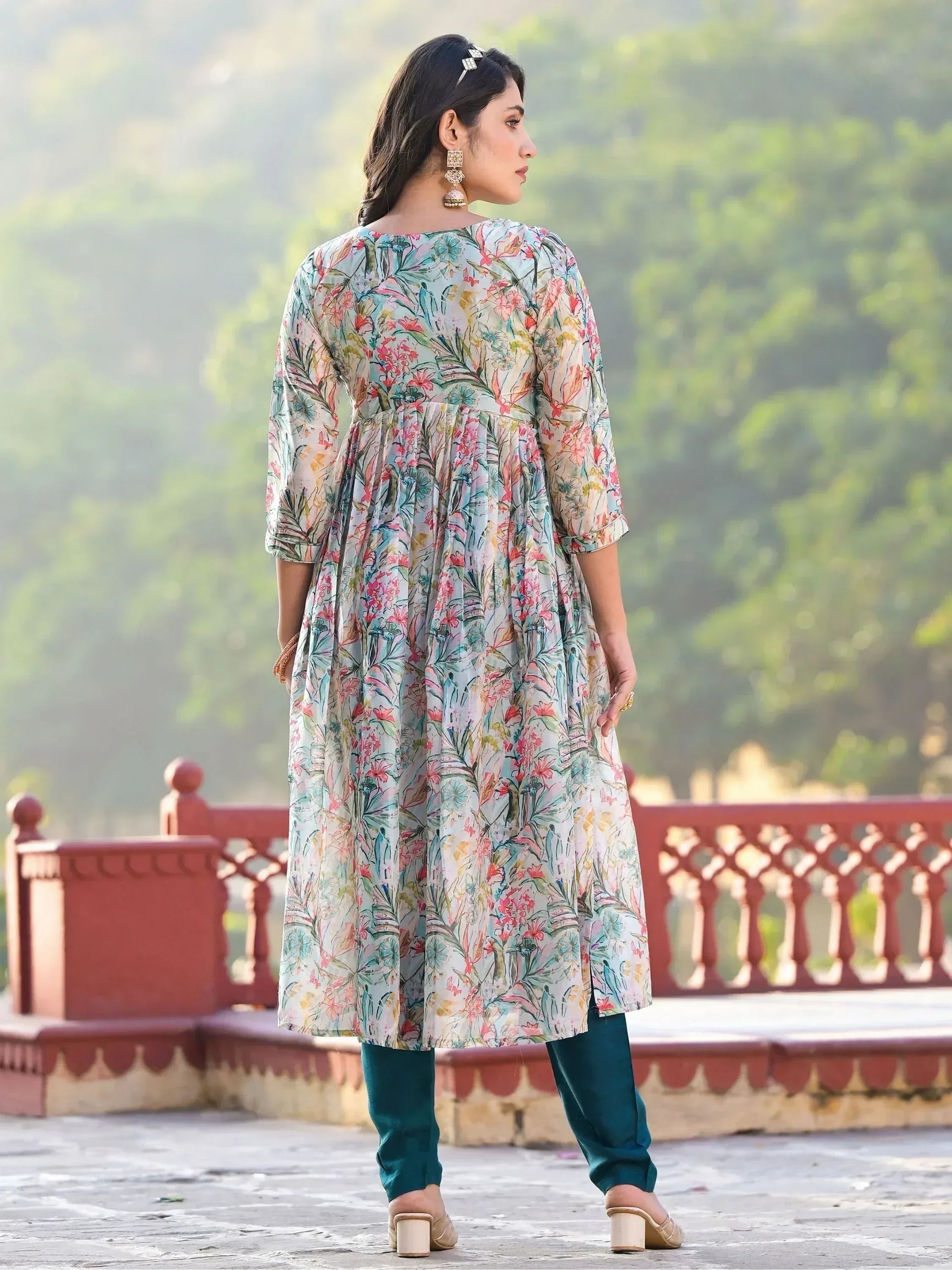 Floral print ethnic kurta with teal pants, perfect for Indian wear occasions