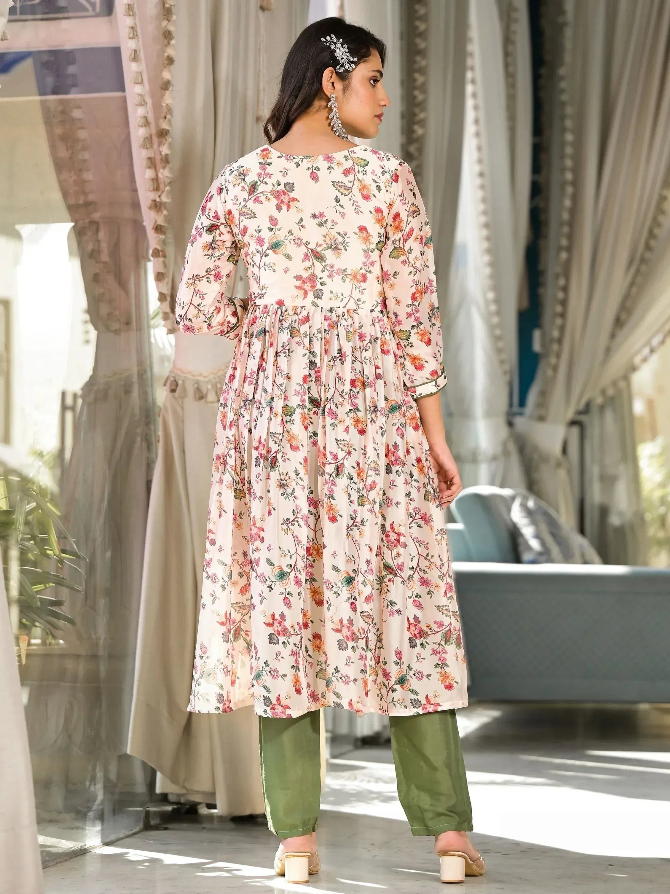 Floral print ethnic kurta with green pants, stylish Indian wear for women