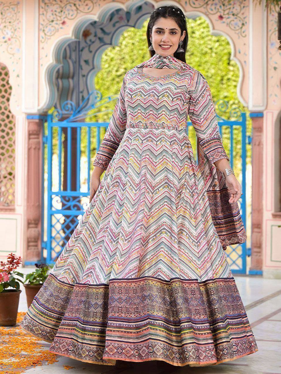 Woman in colorful ethnic anarkali gown with zigzag print, perfect for Indian festivals and occasions