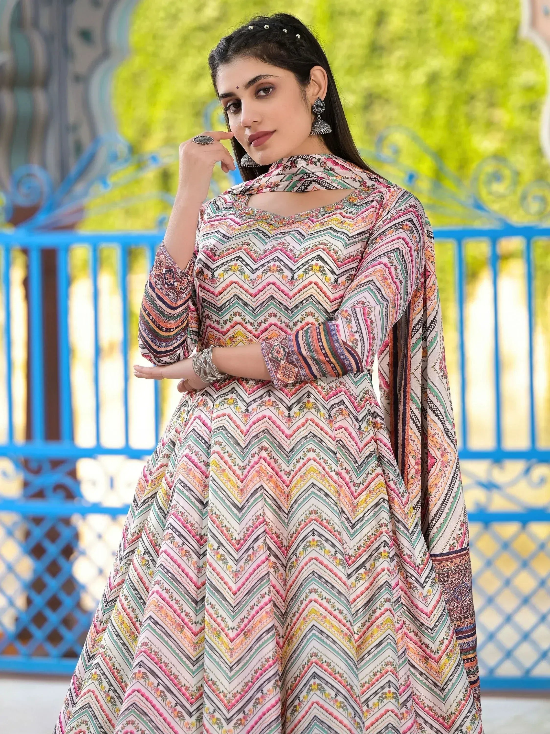 Woman in colorful printed Indian ethnic anarkali suit with dupatta, perfect for festive occasions