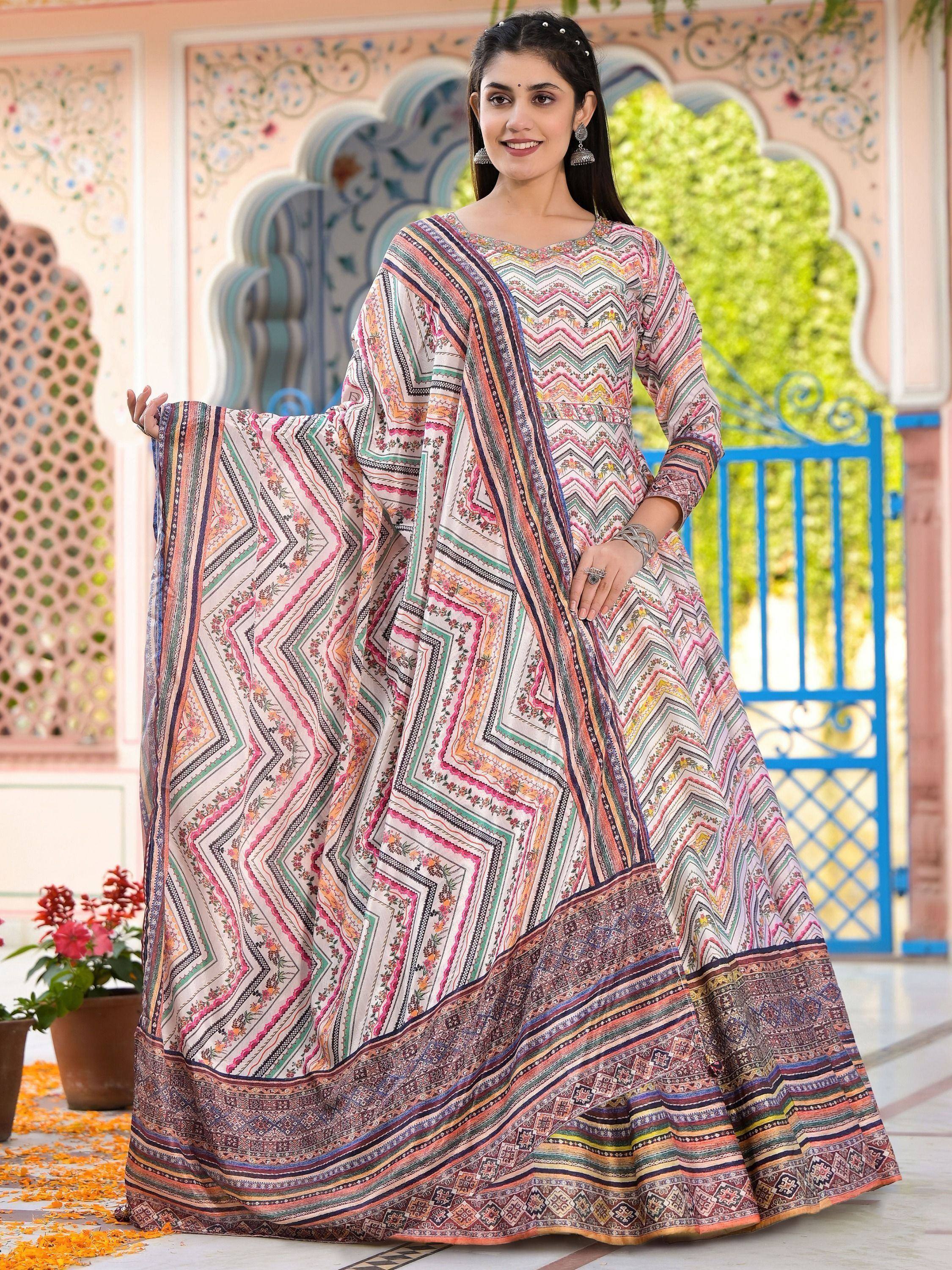 Woman in colorful printed Indian anarkali suit with geometric patterns, perfect for ethnic occasions