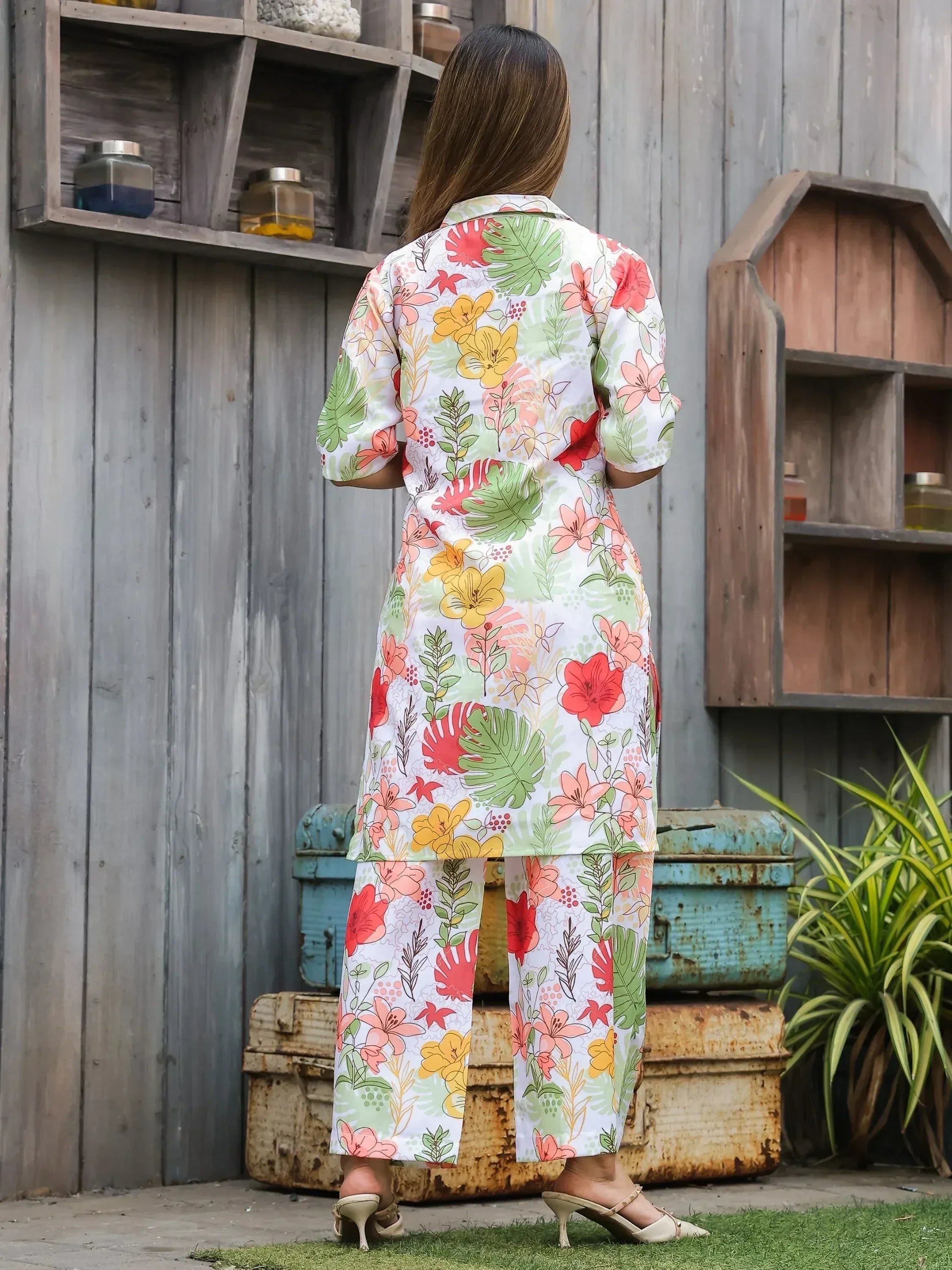 Floral print ethnic kurta set with matching pants, vibrant tropical design for women