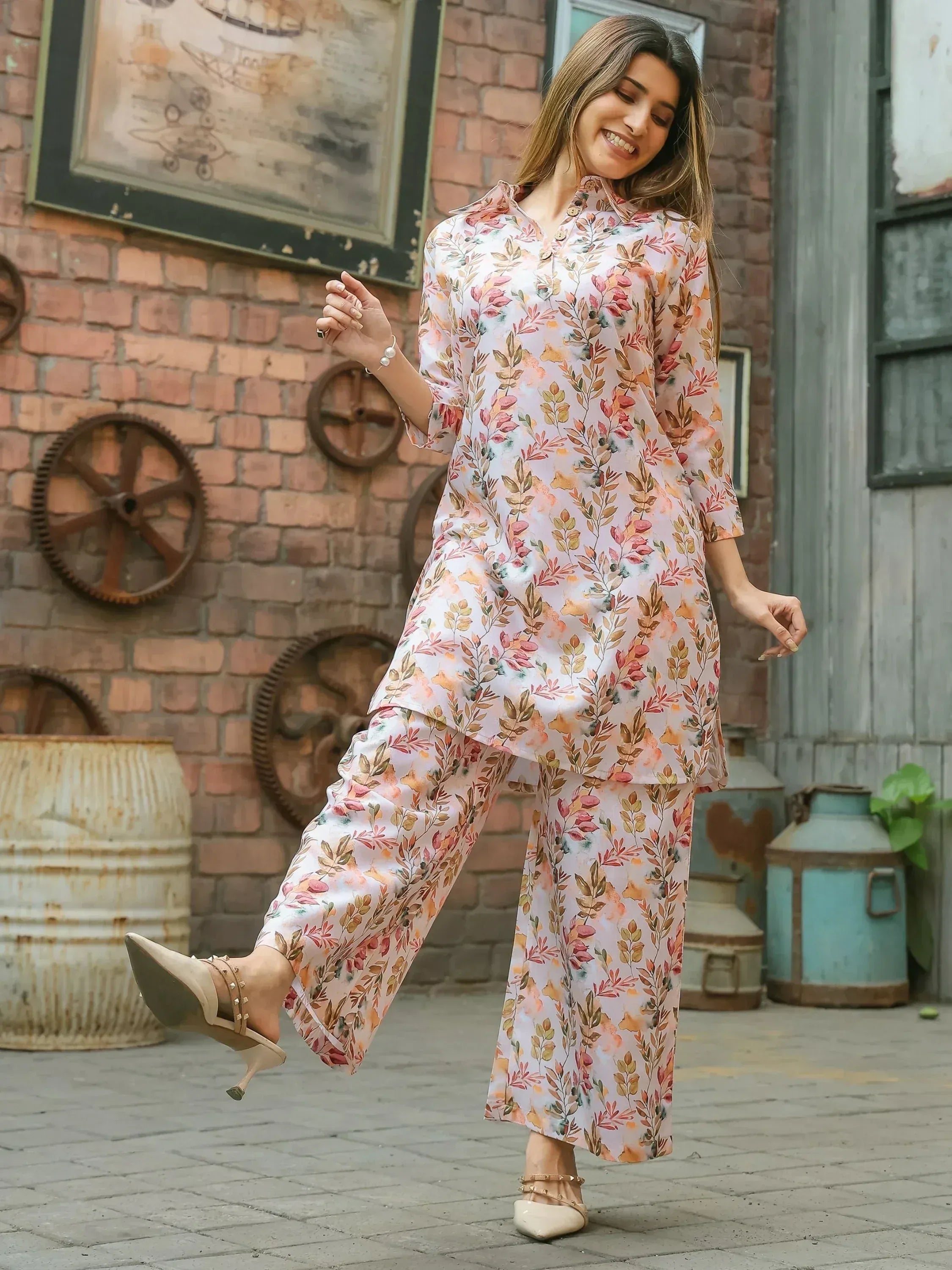 Woman in floral printed kurta and palazzo set, Indian ethnic wear, outdoor setting
