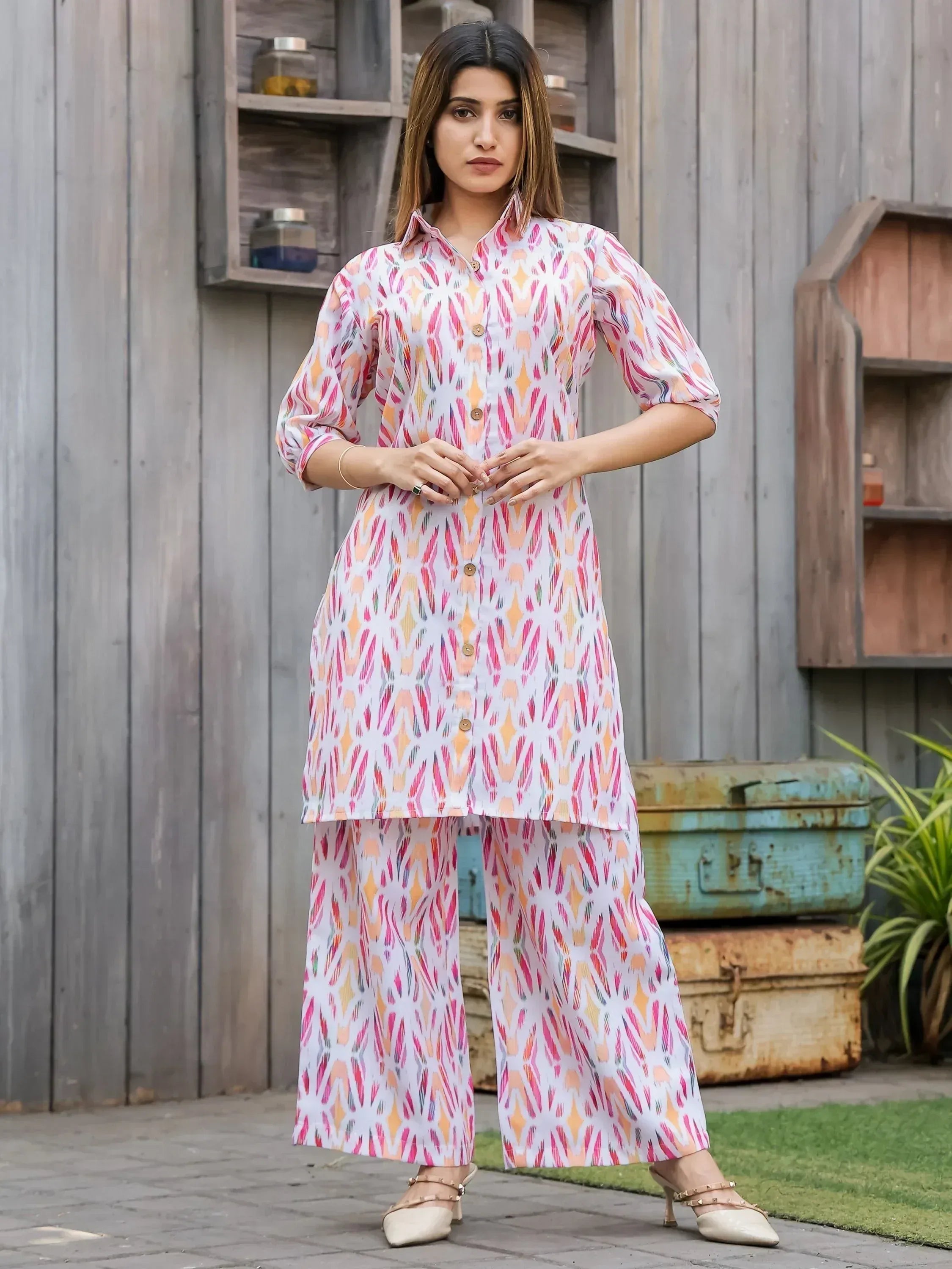 Woman in colorful printed kurta with palazzo pants, ethnic Indian wear for casual occasions