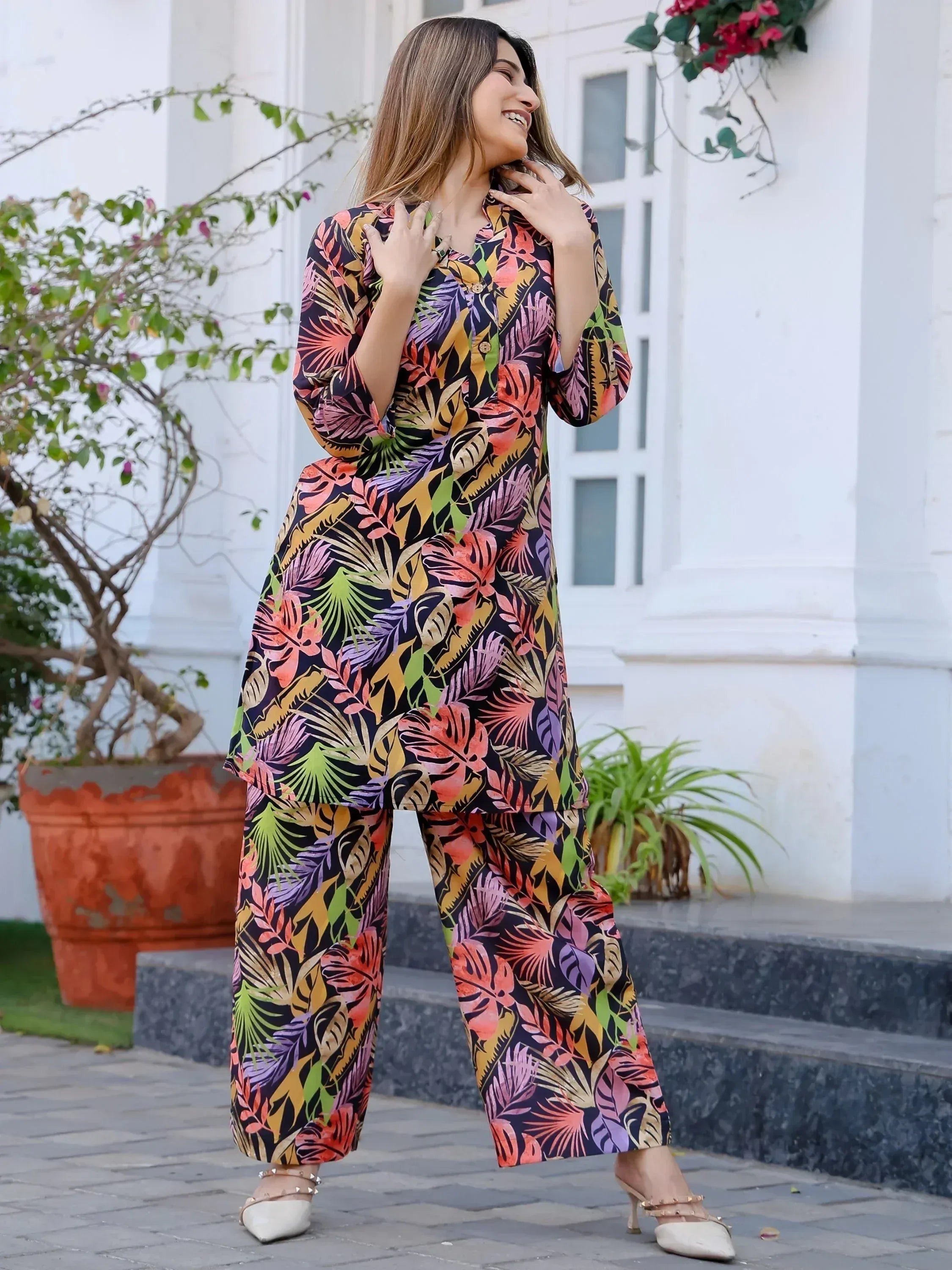 Vibrant tropical print salwar kameez set with wide-leg pants, perfect for ethnic wear occasions