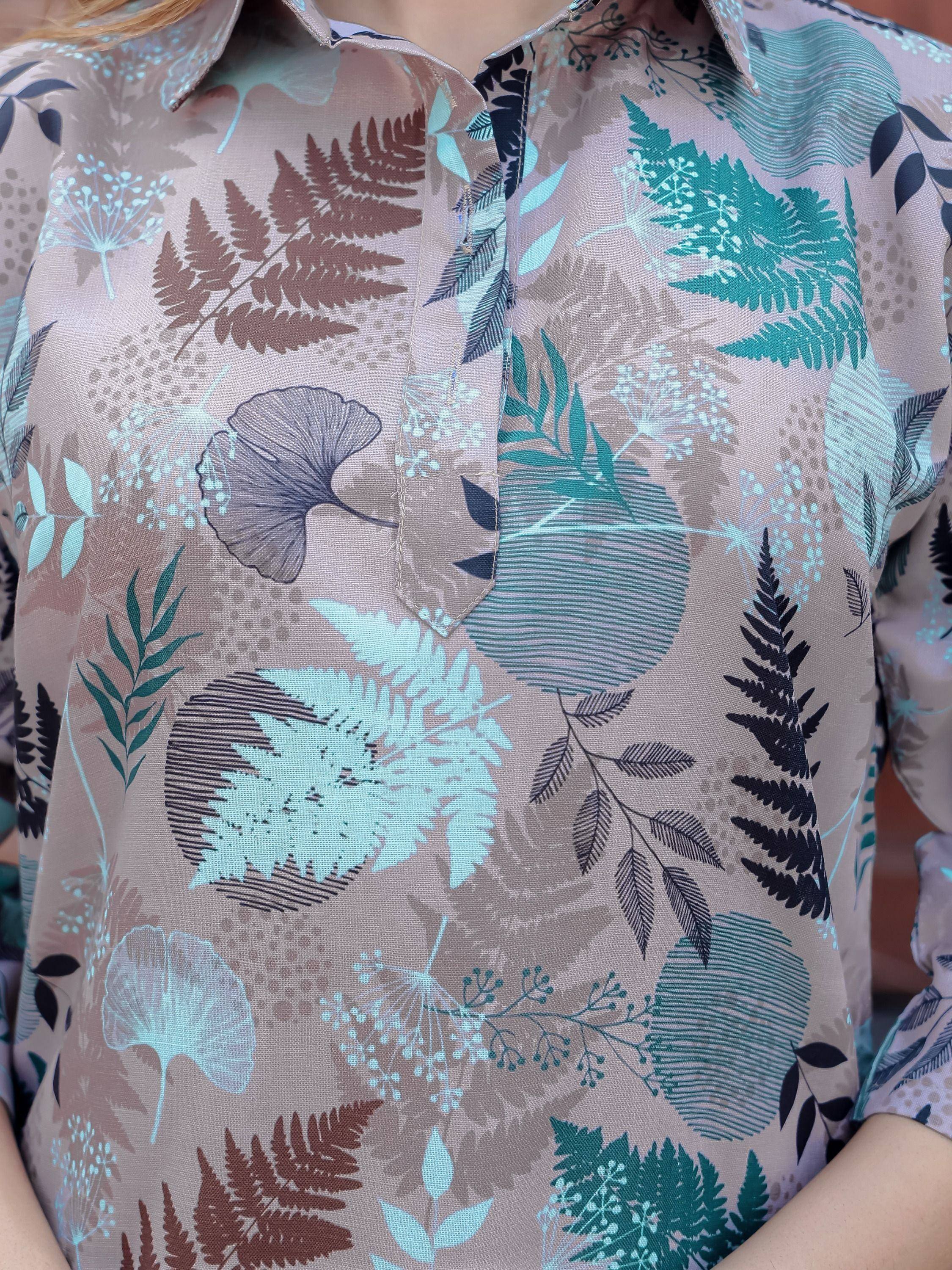 Floral print ethnic kurti with fern and leaf patterns in teal and brown tones