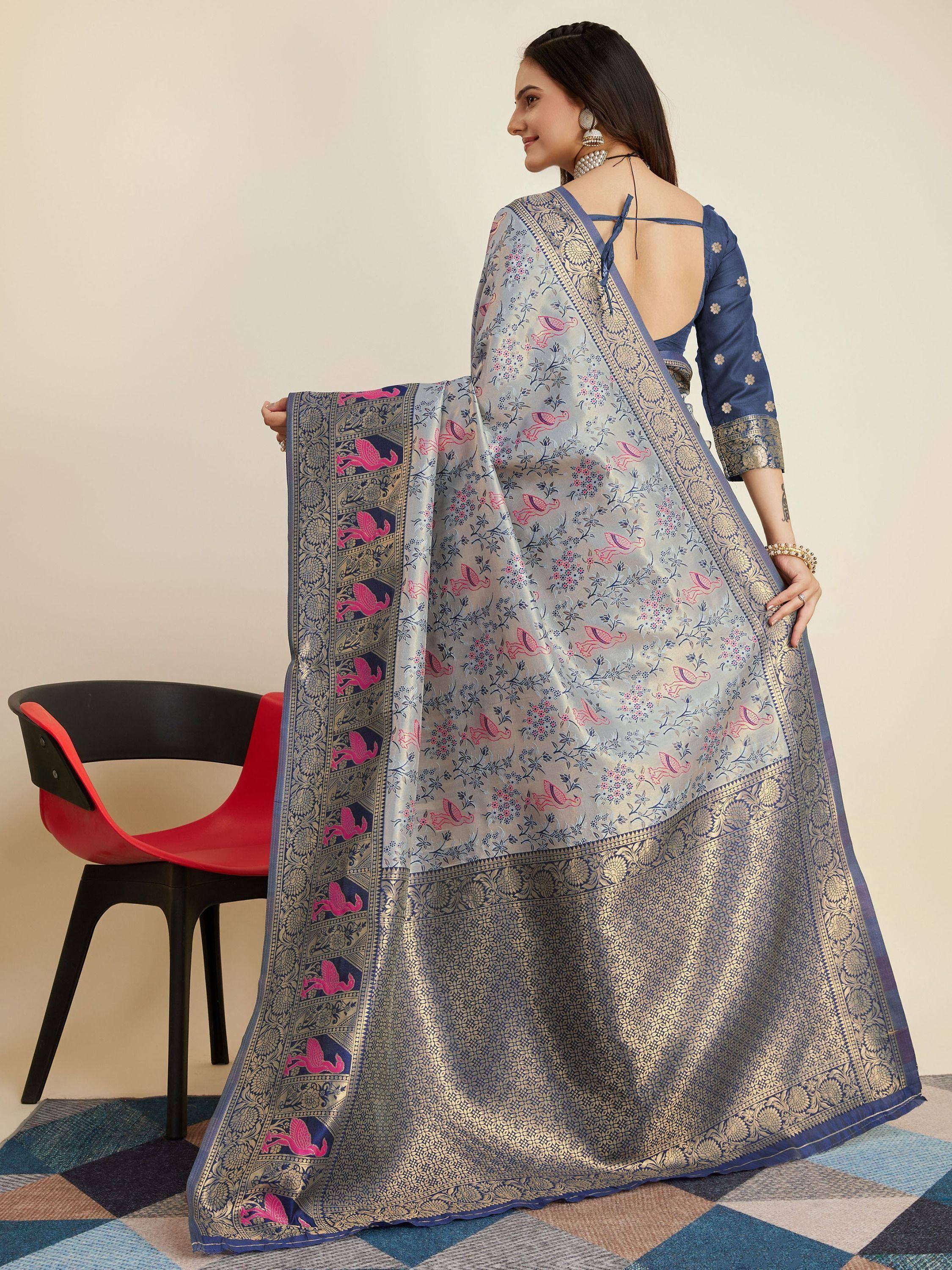 Blue and silver Banarasi saree with pink bird print and gold border, paired with backless blouse for ethnic wear