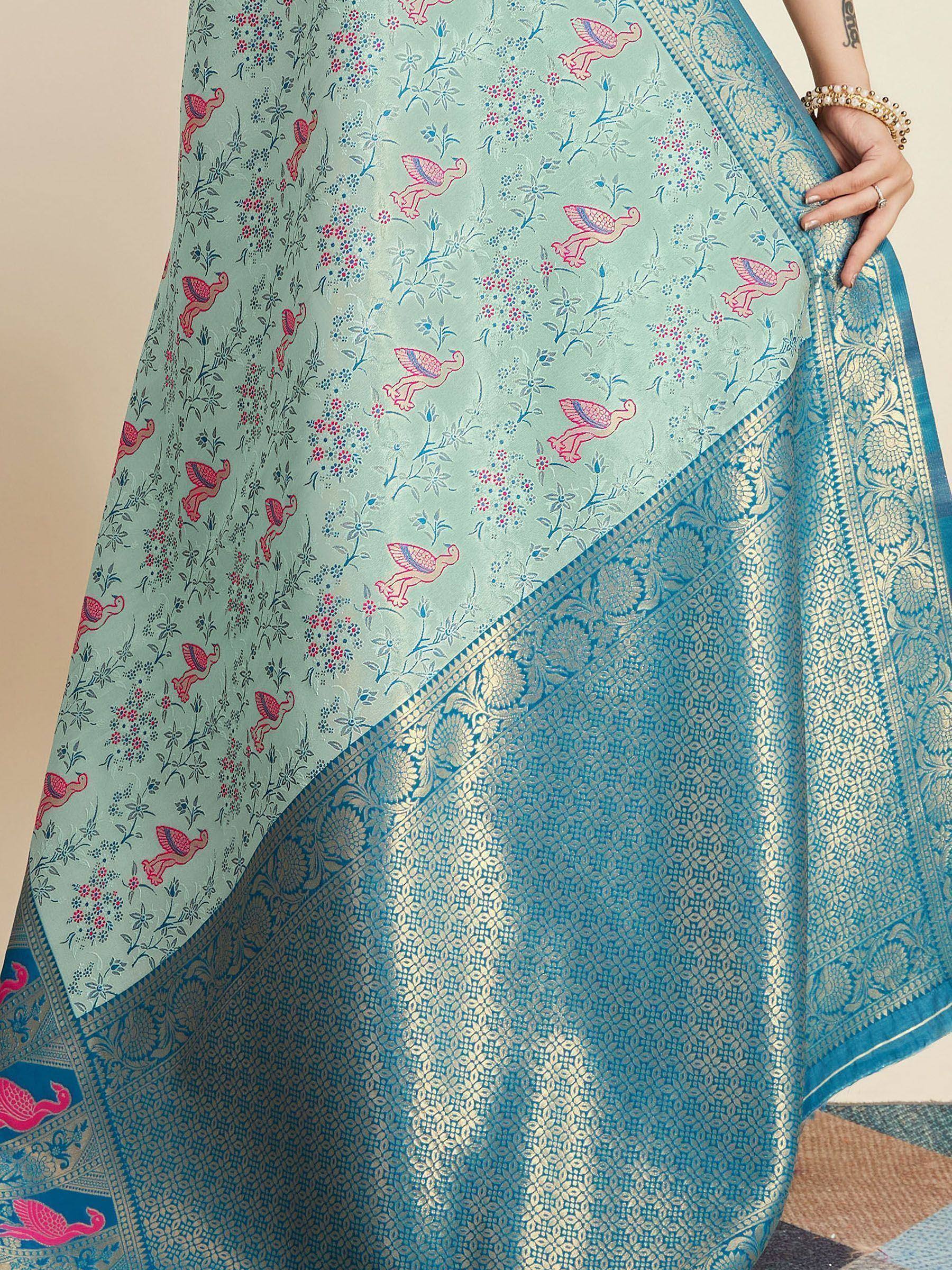 Light blue saree with pink bird and floral print, gold border, ethnic wear