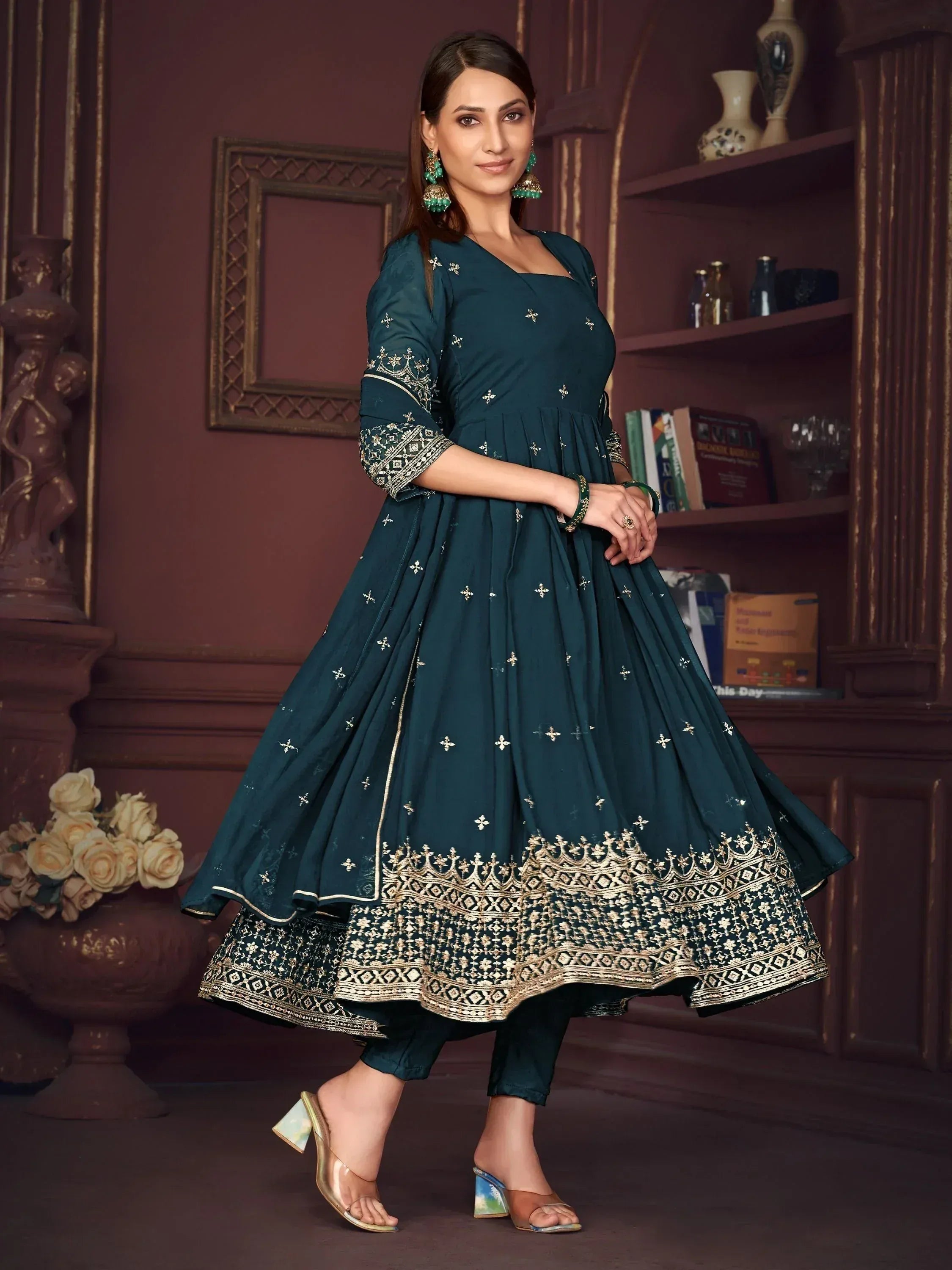 Teal embroidered anarkali suit with gold detailing, perfect for Indian ethnic wear occasions