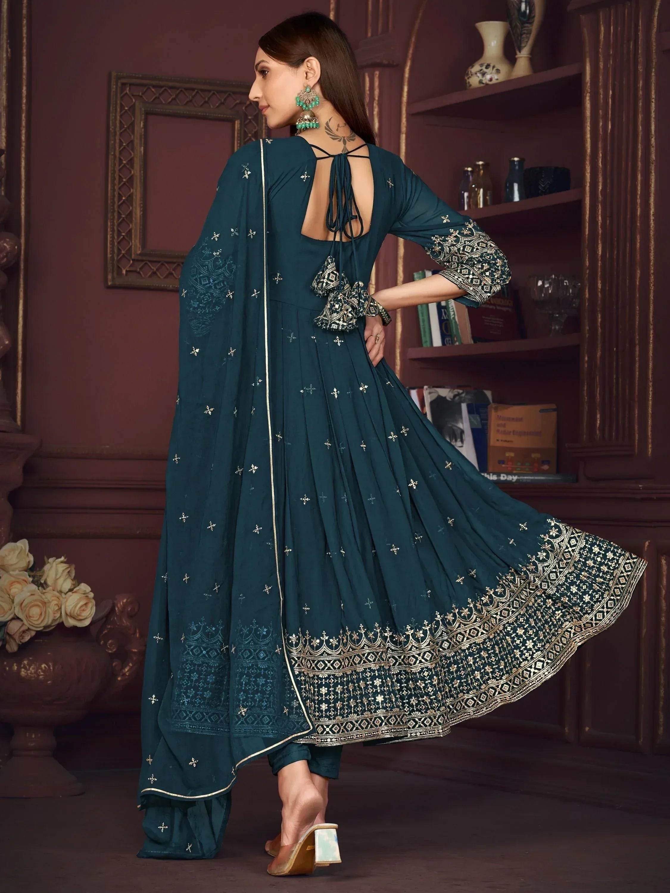 Teal ethnic anarkali with gold embroidery and back tie detail, paired with matching dupatta