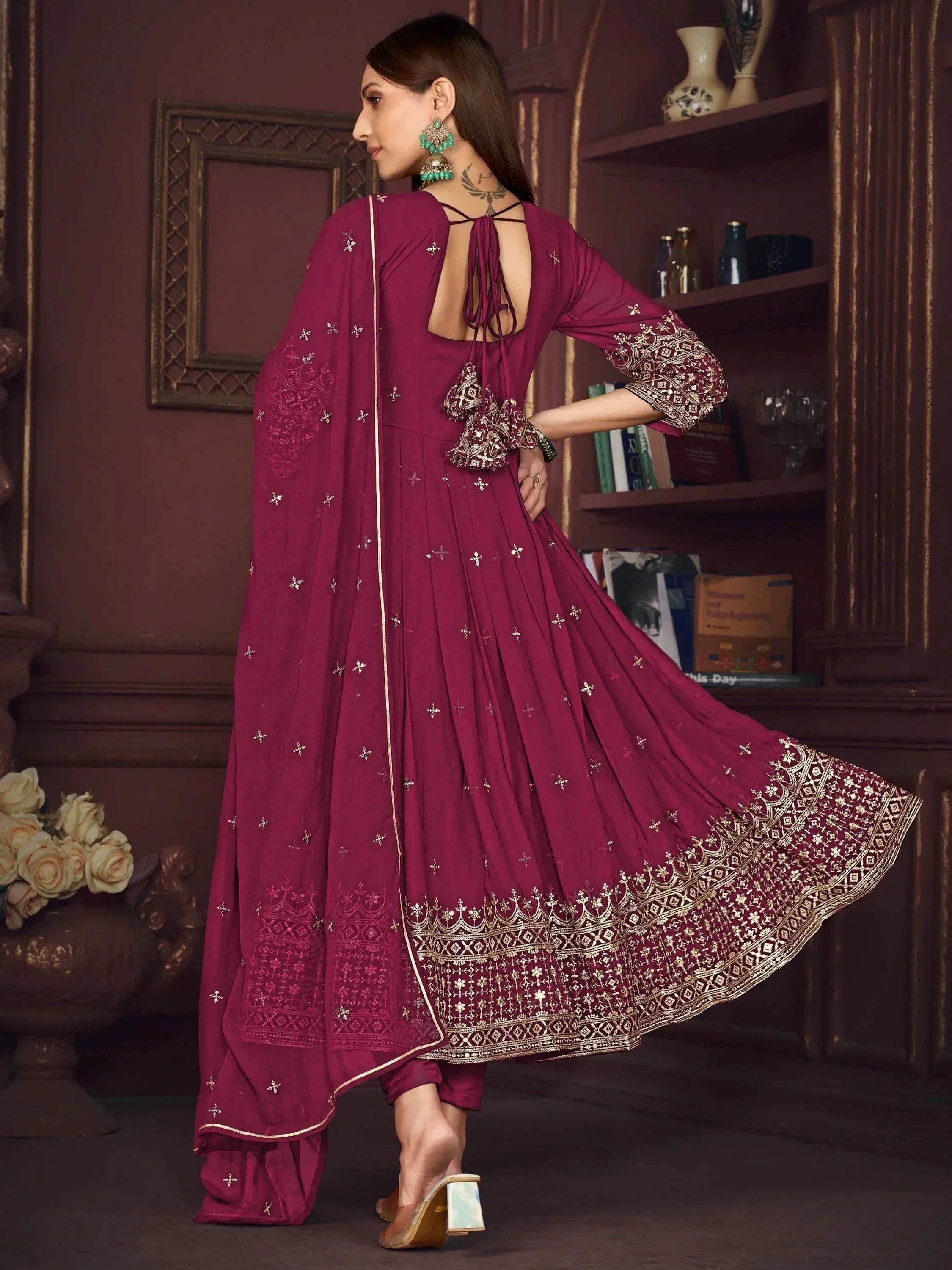 Elegant maroon ethnic anarkali with gold embroidery, back tie detail, and matching dupatta for festive occasions