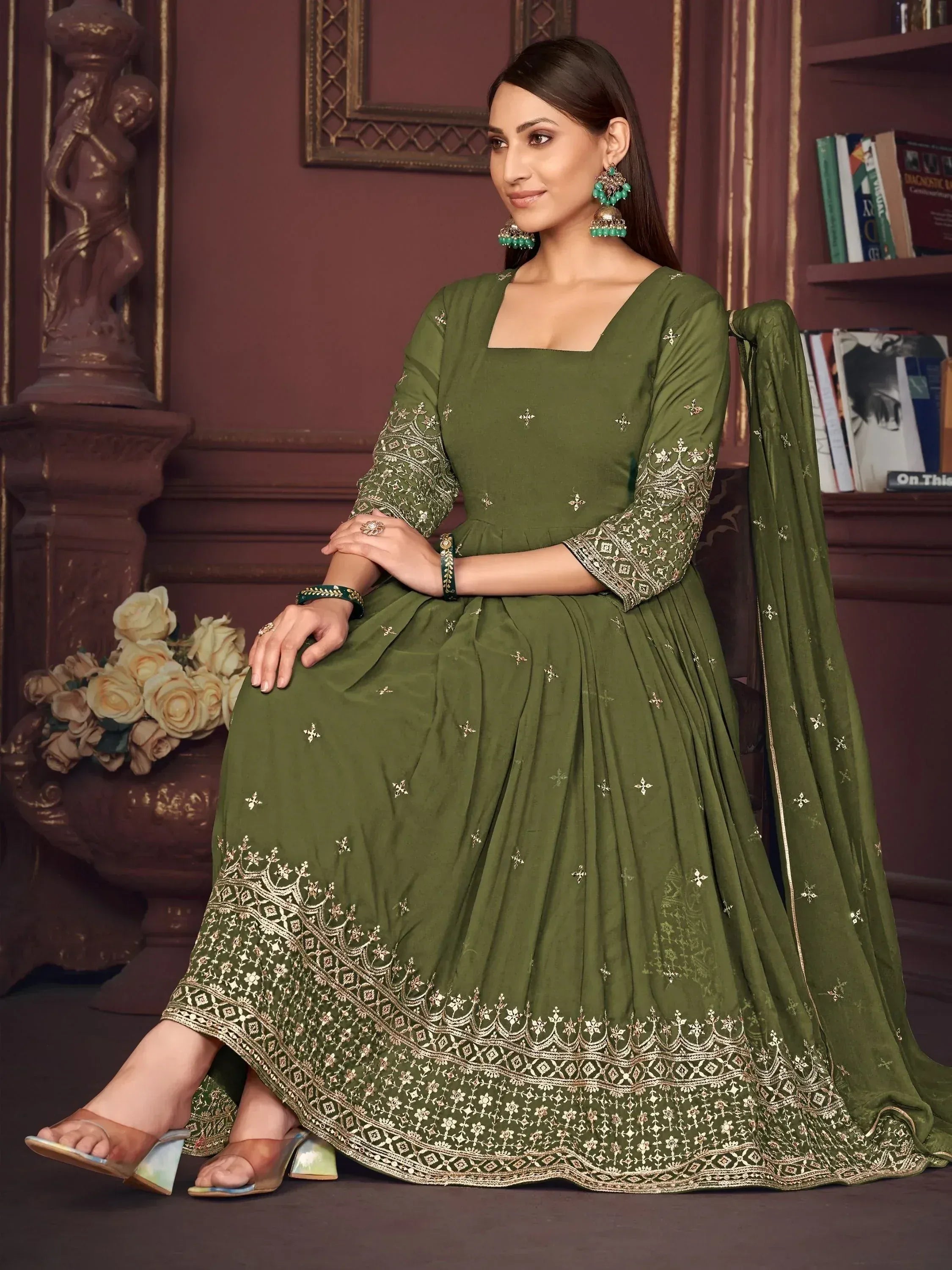 Olive green embroidered anarkali suit with gold detailing, perfect for Indian ethnic occasions.