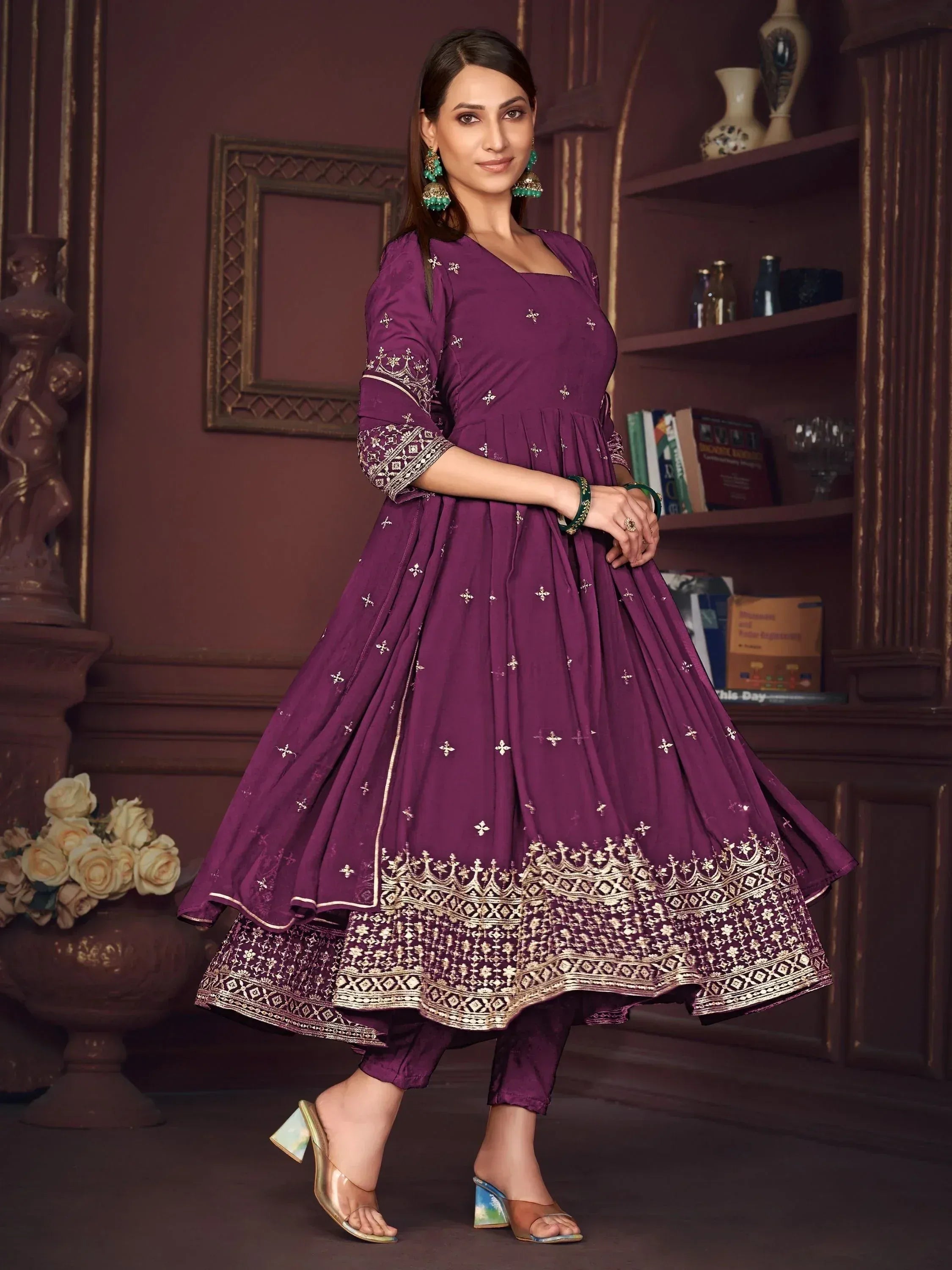 Purple embroidered Anarkali suit with gold detailing, perfect for Indian ethnic wear occasions