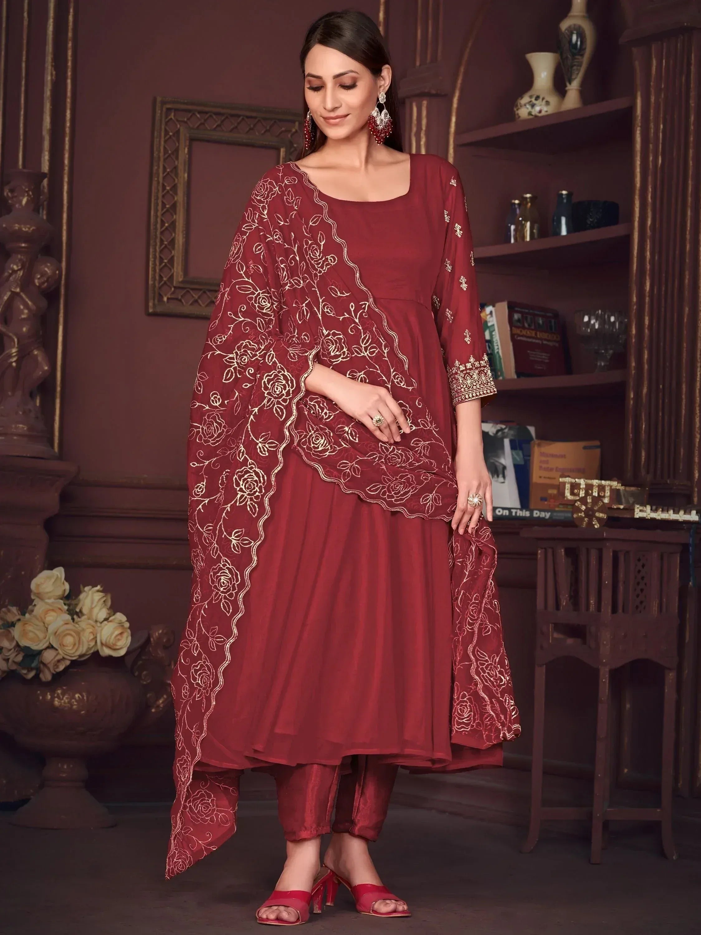 Maroon ethnic salwar kameez with gold floral embroidery, perfect for Indian festive occasions