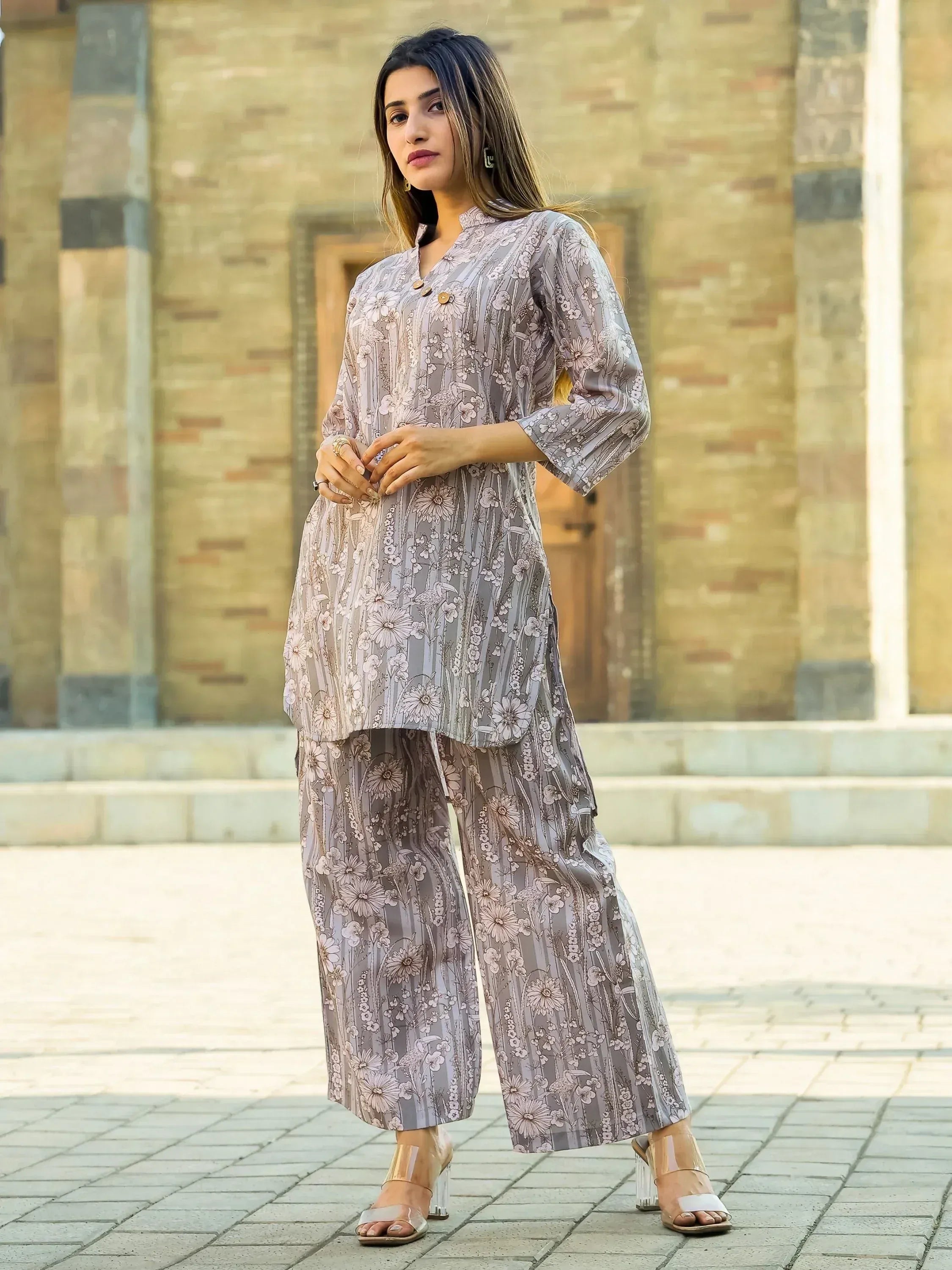 Woman in grey floral print salwar kameez with wide-leg pants, stylish ethnic wear for women