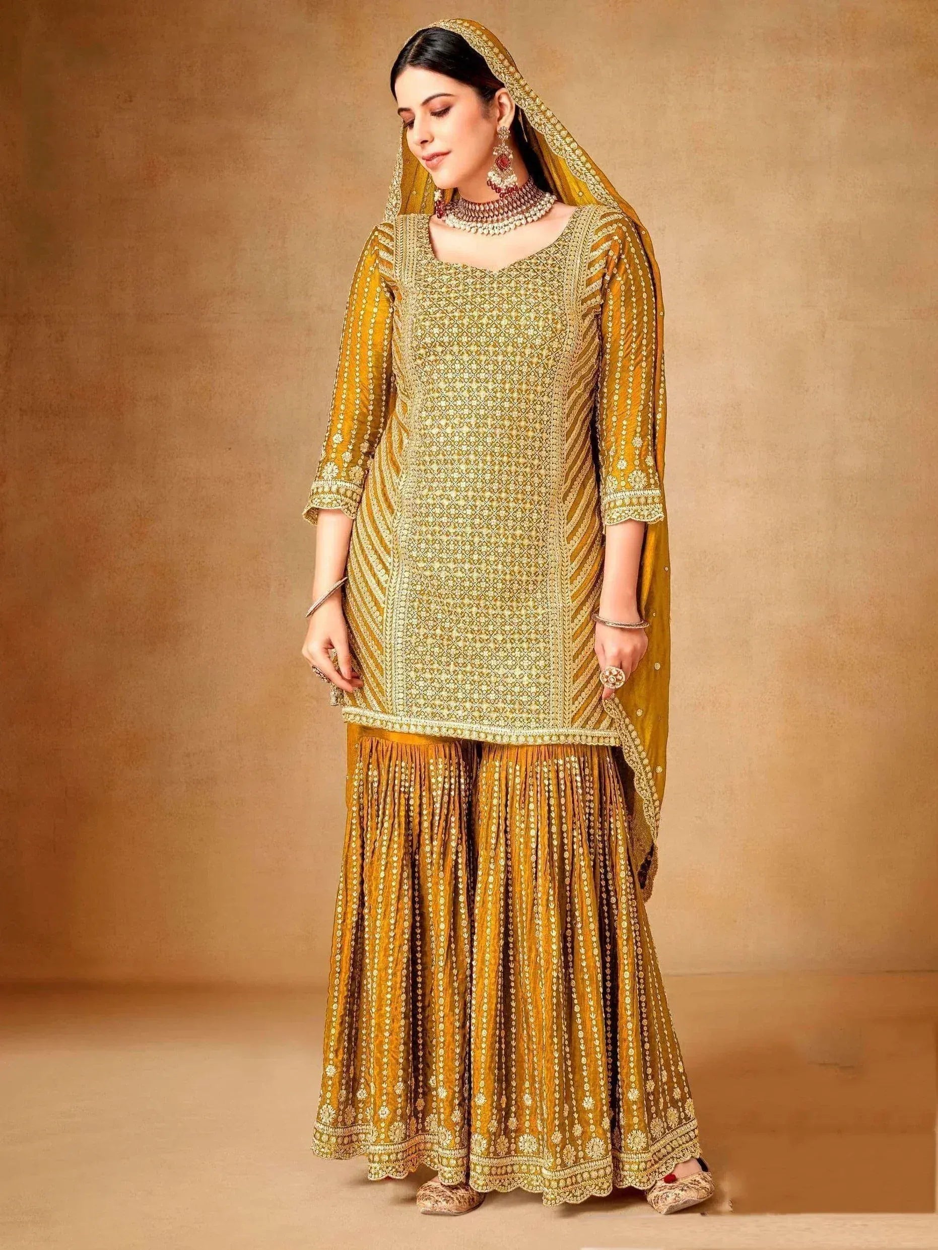Elegant mustard yellow embroidered lehenga choli with dupatta, perfect for Indian ethnic occasions