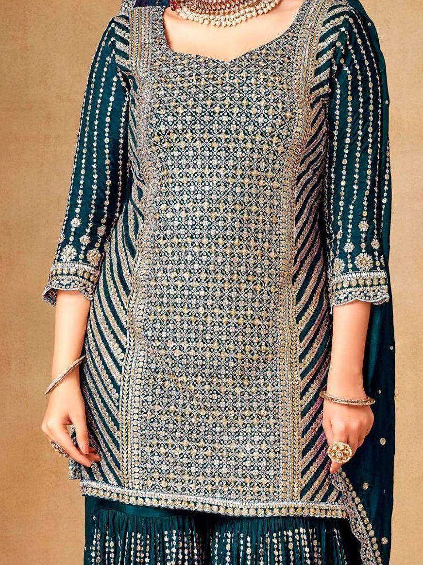 Elegant teal embroidered salwar kameez with intricate gold patterns and matching dupatta