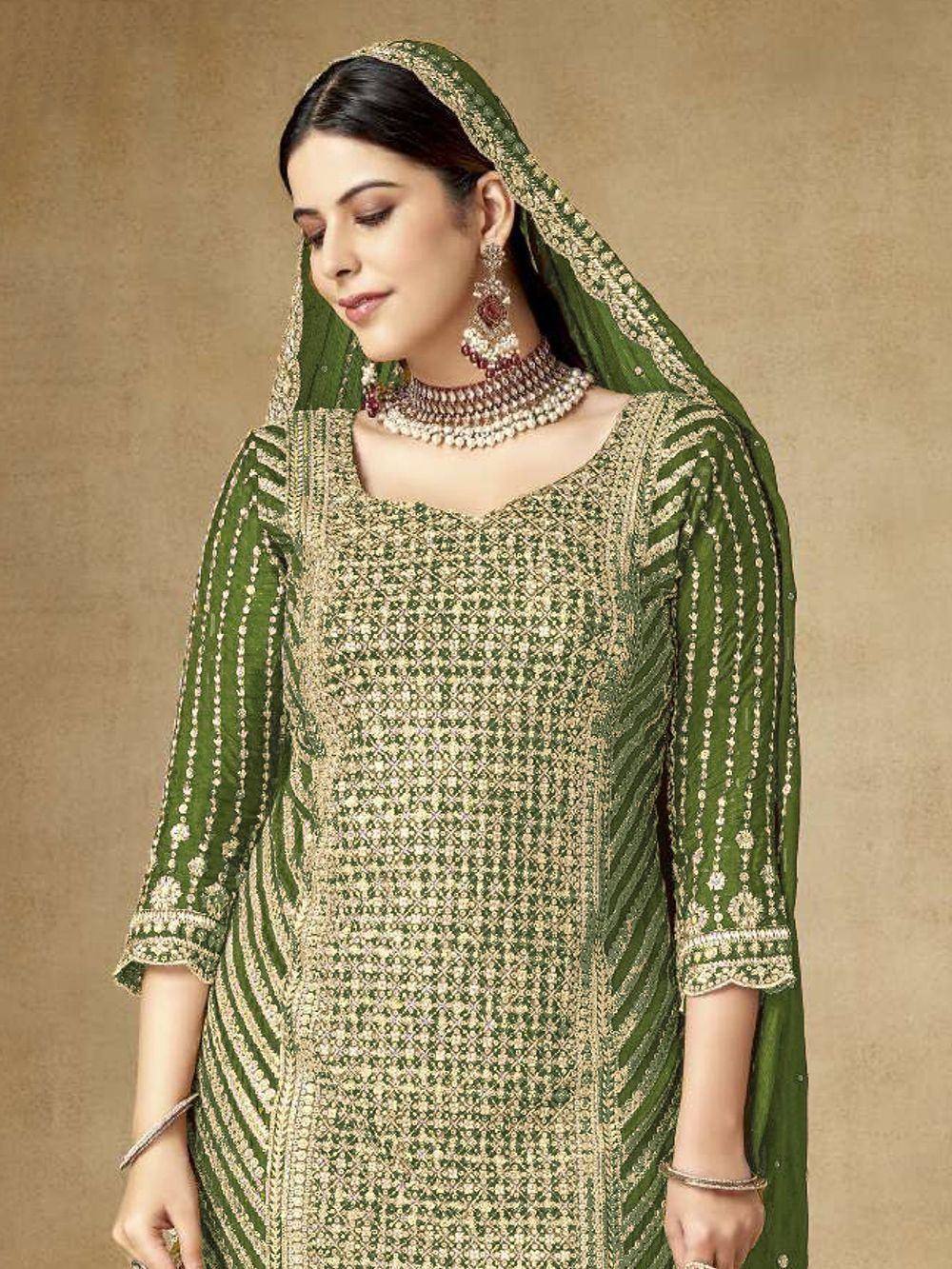 Green embroidered ethnic kurti with matching dupatta and jewelry