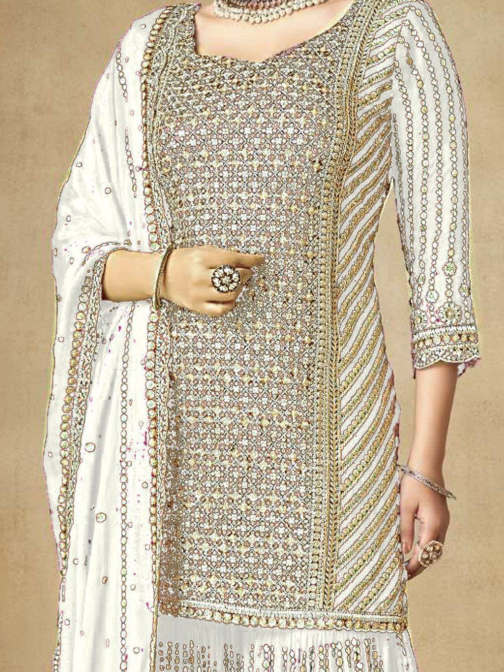 Elegant white designer salwar kameez with intricate gold embroidery and embellished dupatta