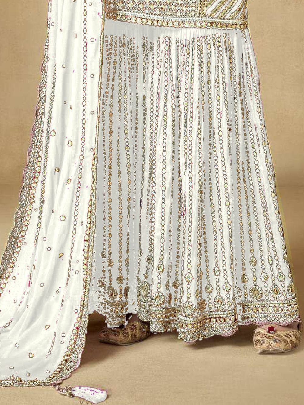 Elegant white lehenga choli with gold embroidery and embellished dupatta, perfect for Indian ethnic wear