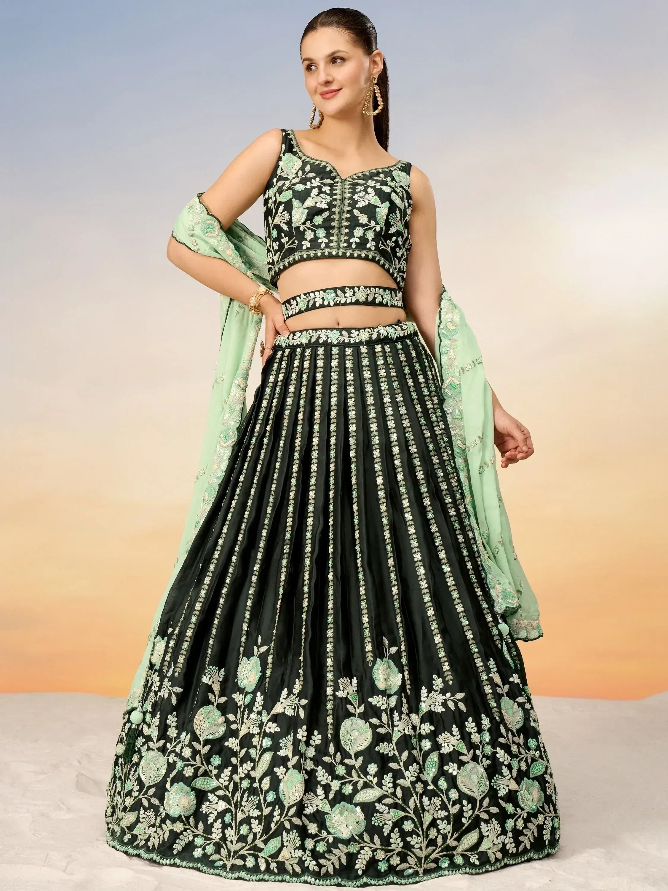 Green embroidered lehenga choli with floral design, perfect for Indian ethnic wear and festive occasions.