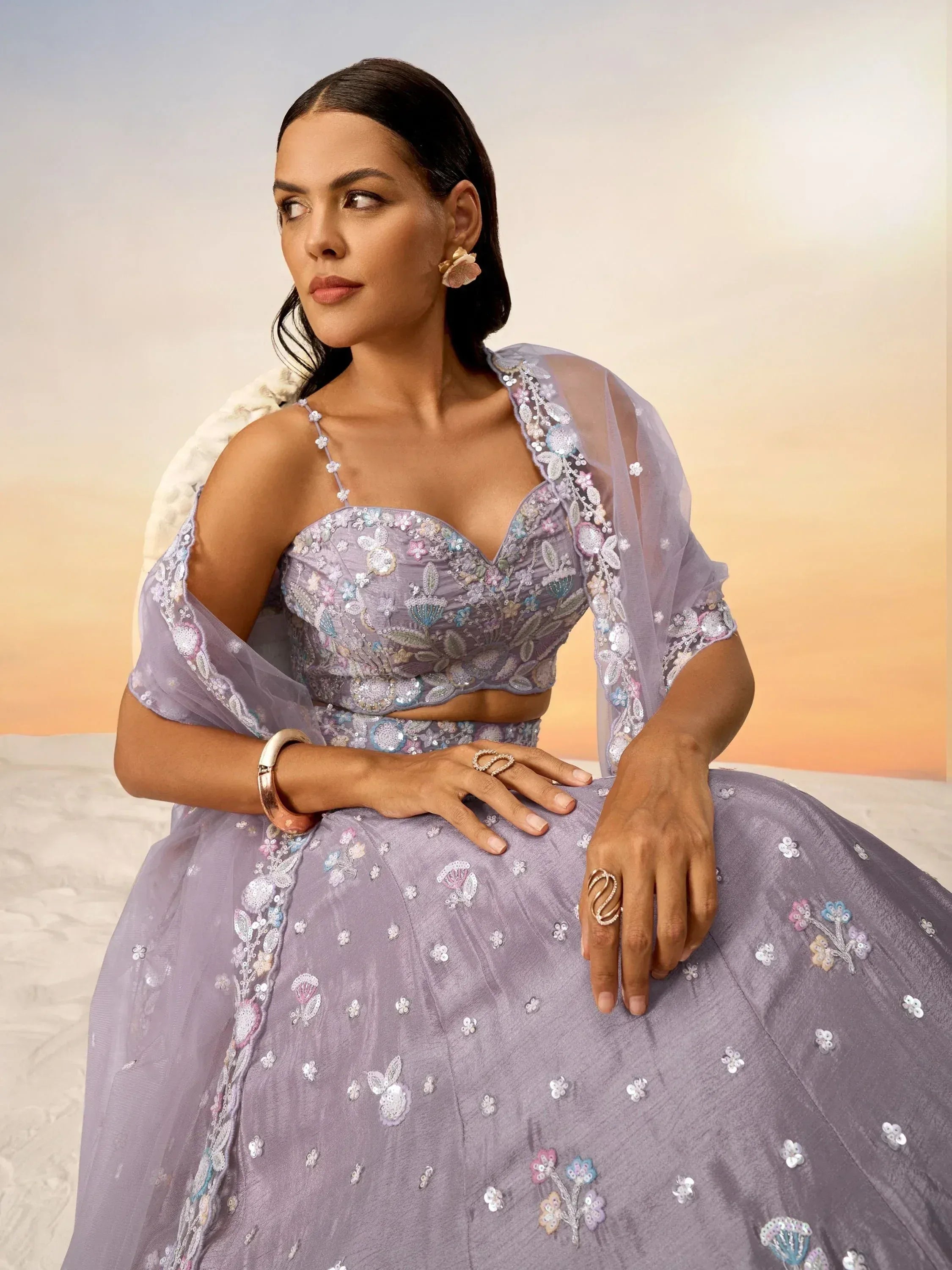 Lavender designer lehenga choli with floral embroidery and sequins, perfect for Indian ethnic wear.
