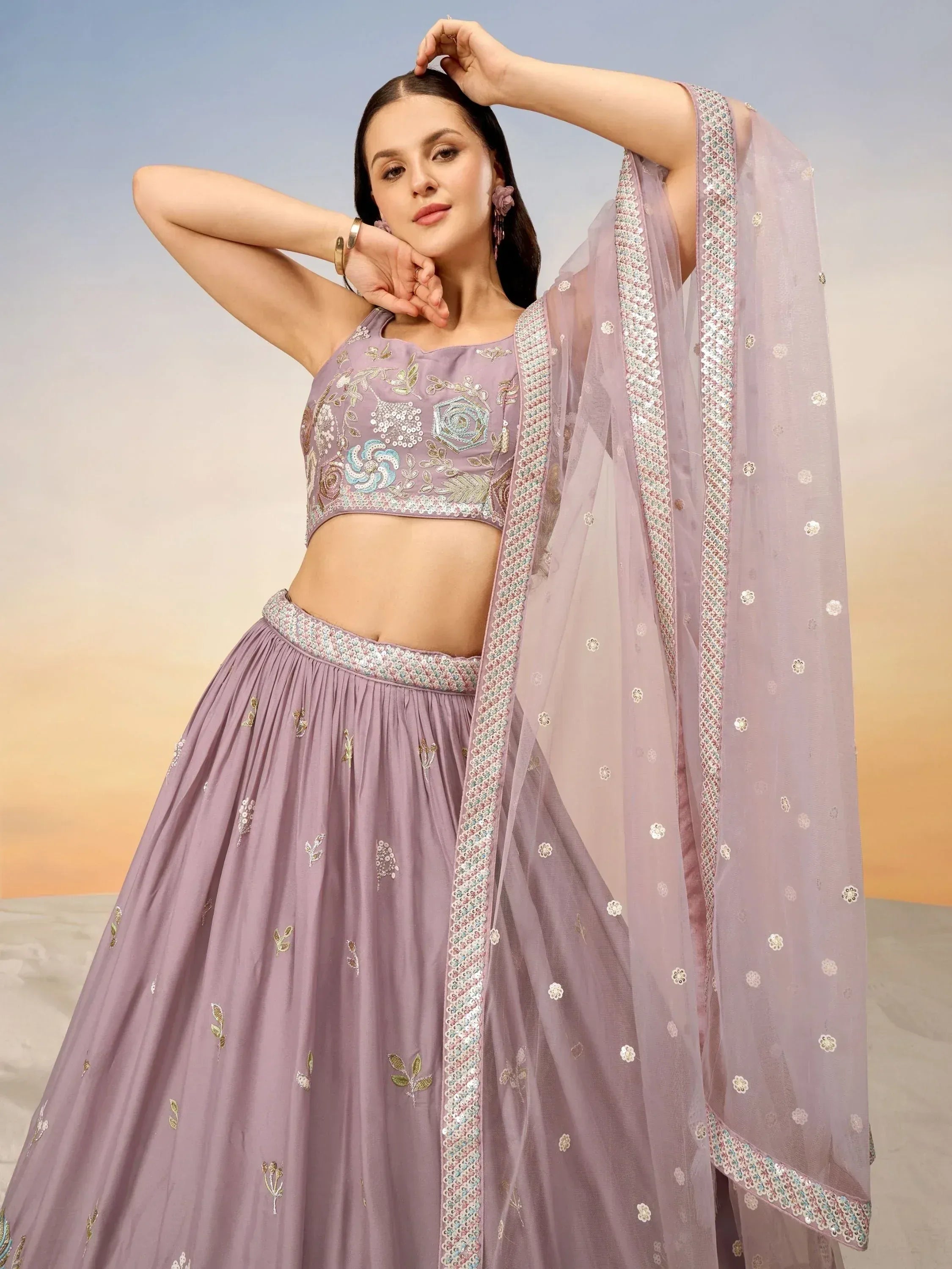 Elegant lavender lehenga choli with floral embroidery and matching dupatta for Indian ethnic wear
