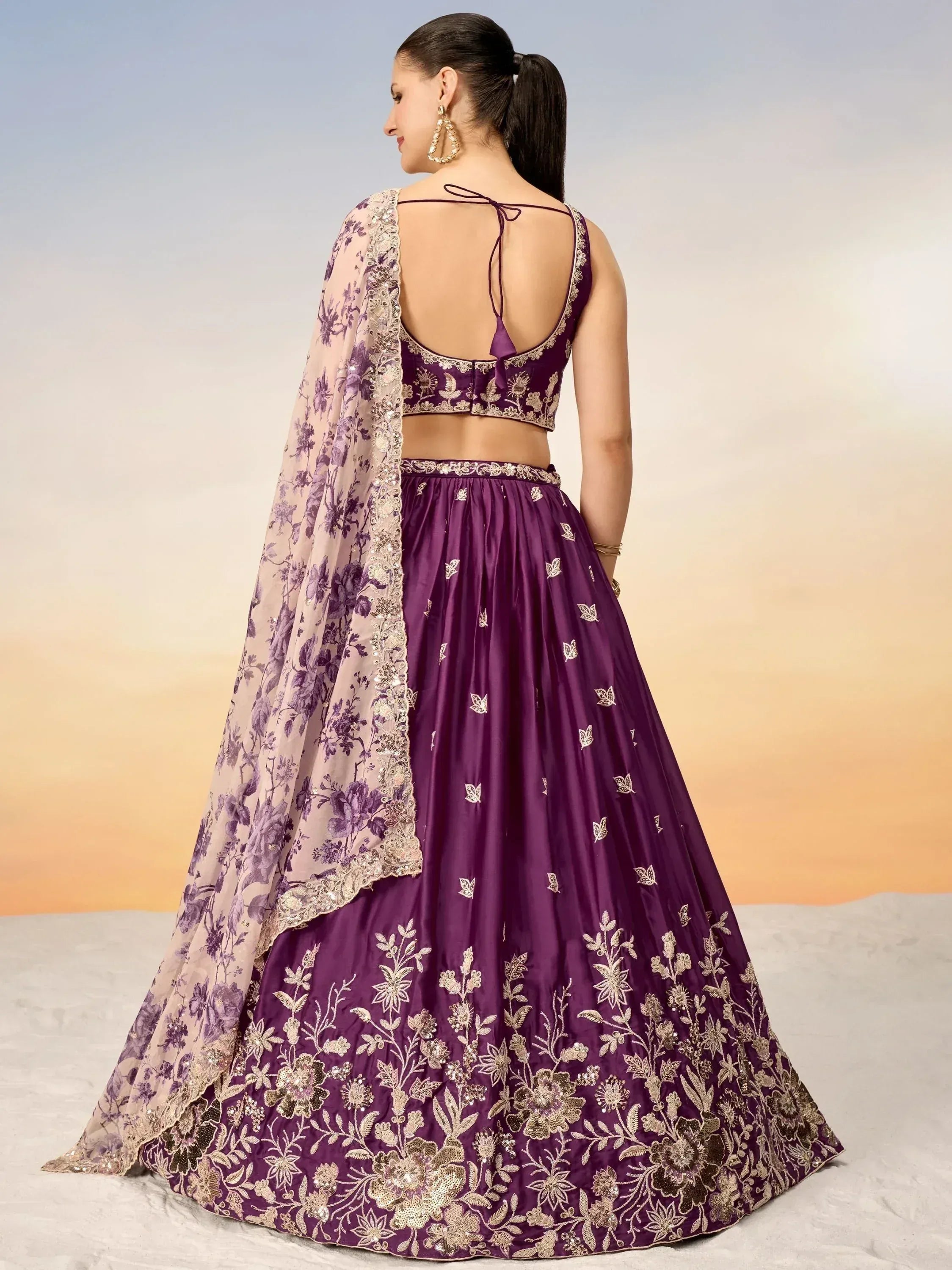 Purple designer lehenga choli with gold embroidery and floral dupatta, ethnic Indian wear