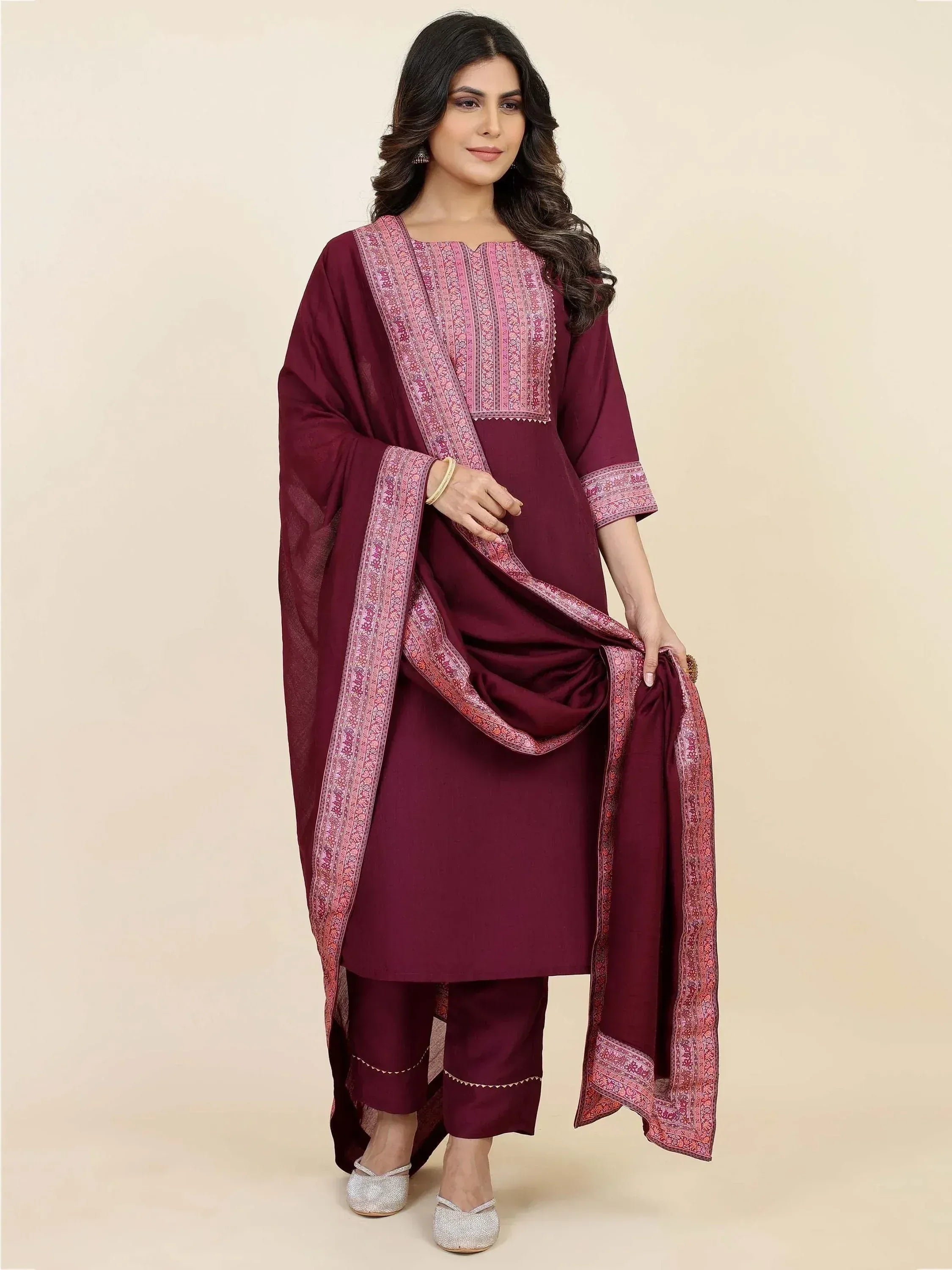 Maroon ethnic salwar kameez with pink embroidered dupatta, perfect for Indian occasions