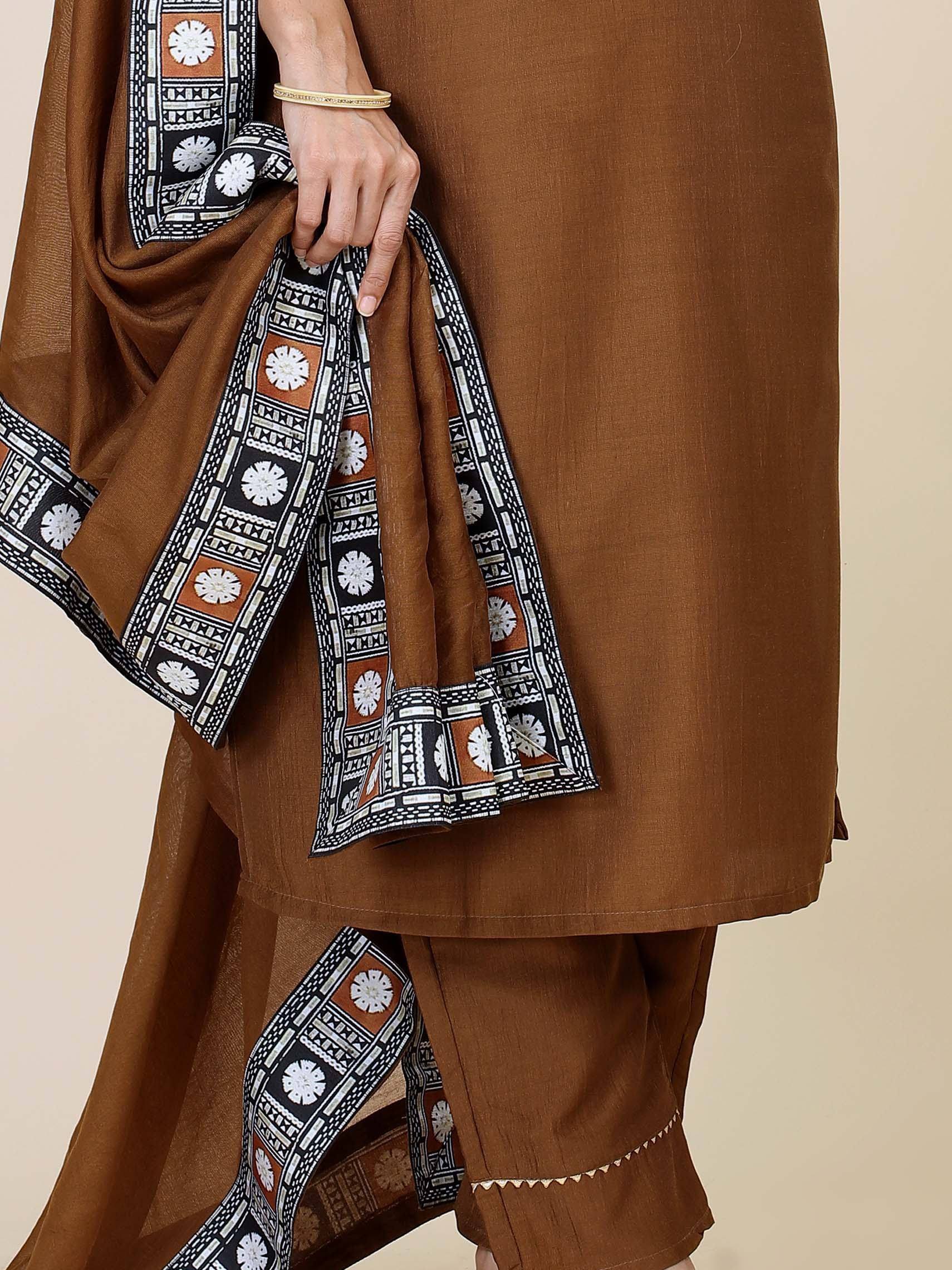 Brown ethnic salwar kameez with printed dupatta, traditional Indian wear