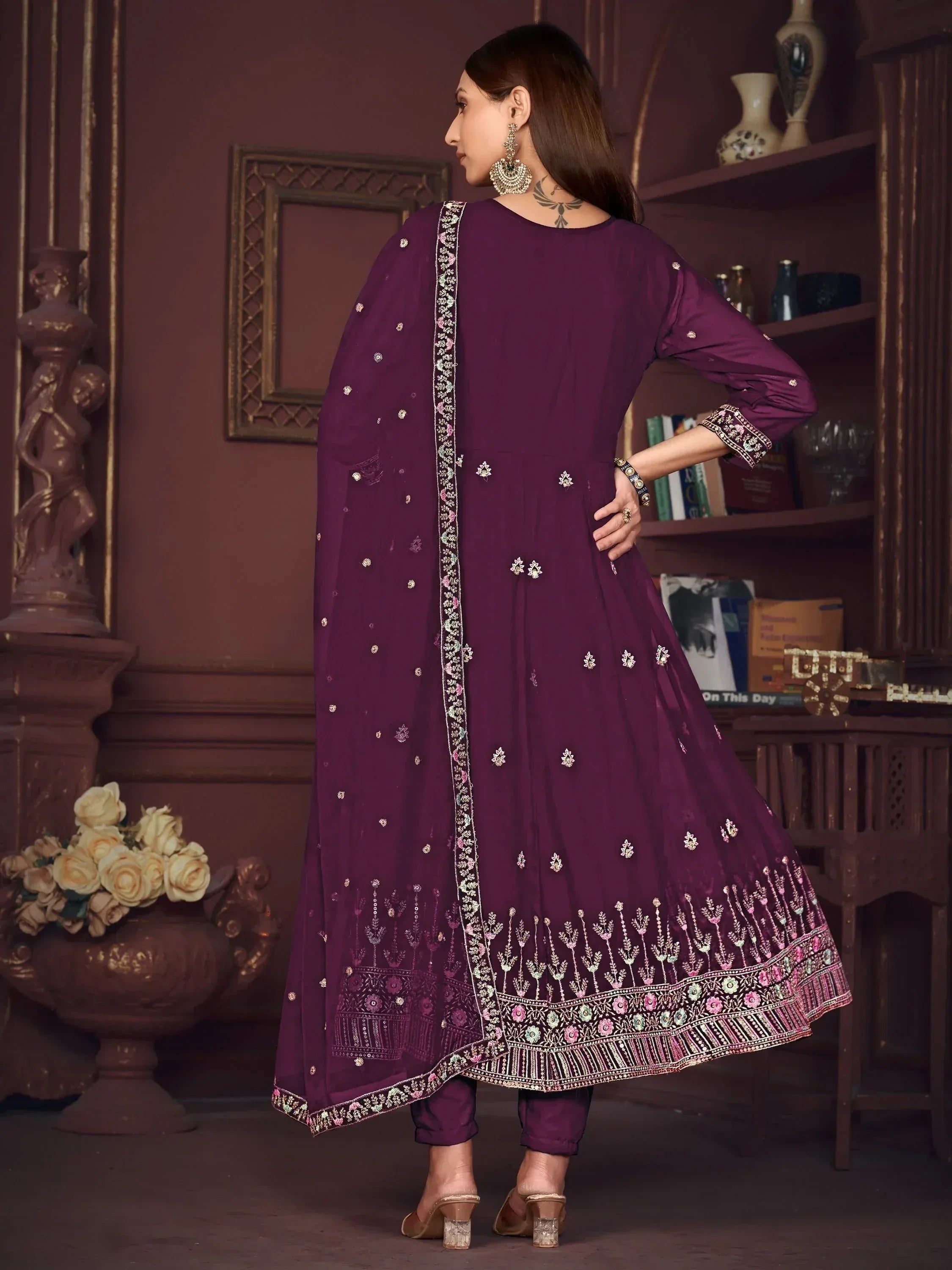 Elegant purple embroidered anarkali suit with floral detailing and matching dupatta