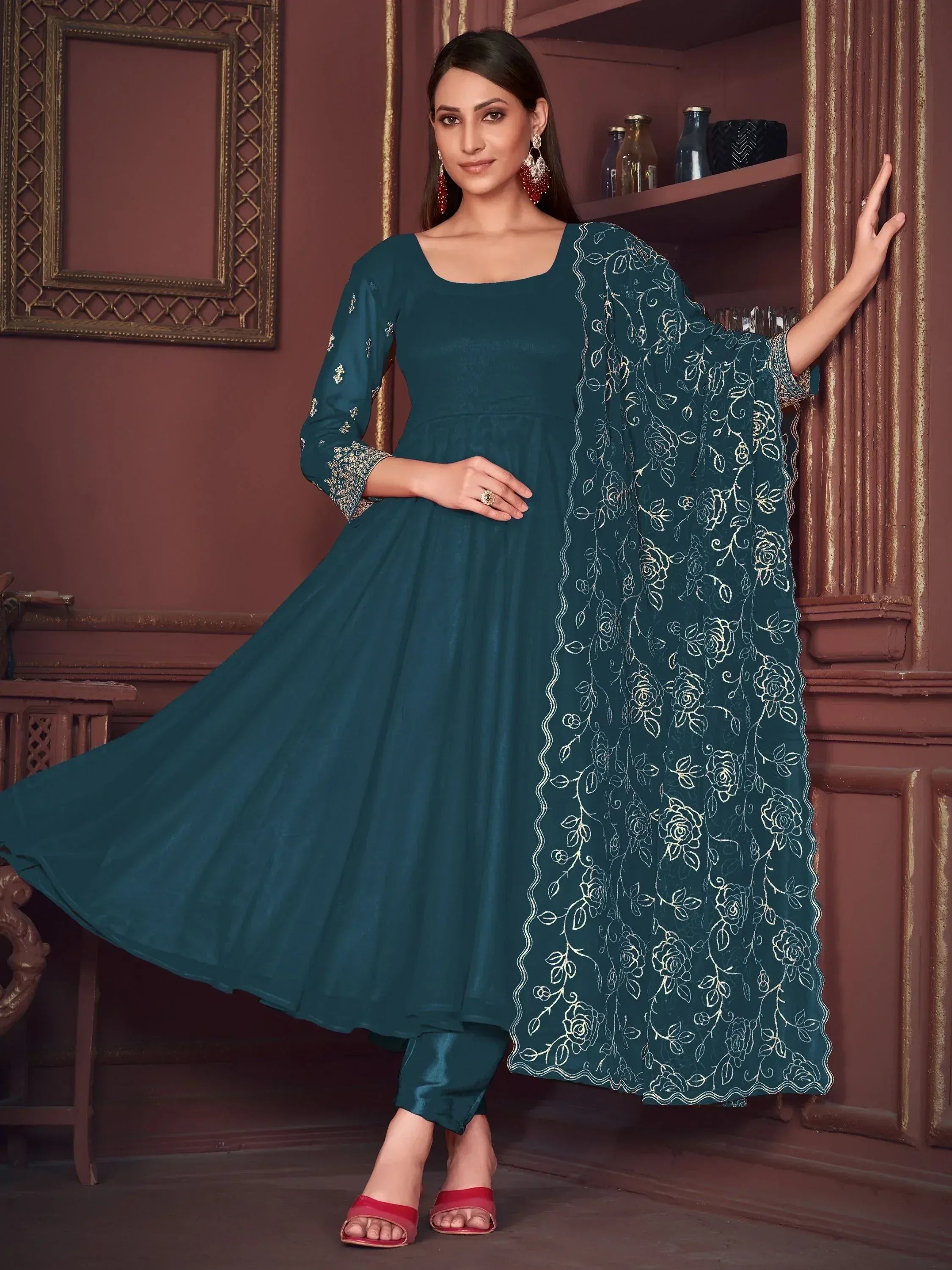Teal ethnic anarkali suit with floral embroidery and matching dupatta, perfect for Indian occasions