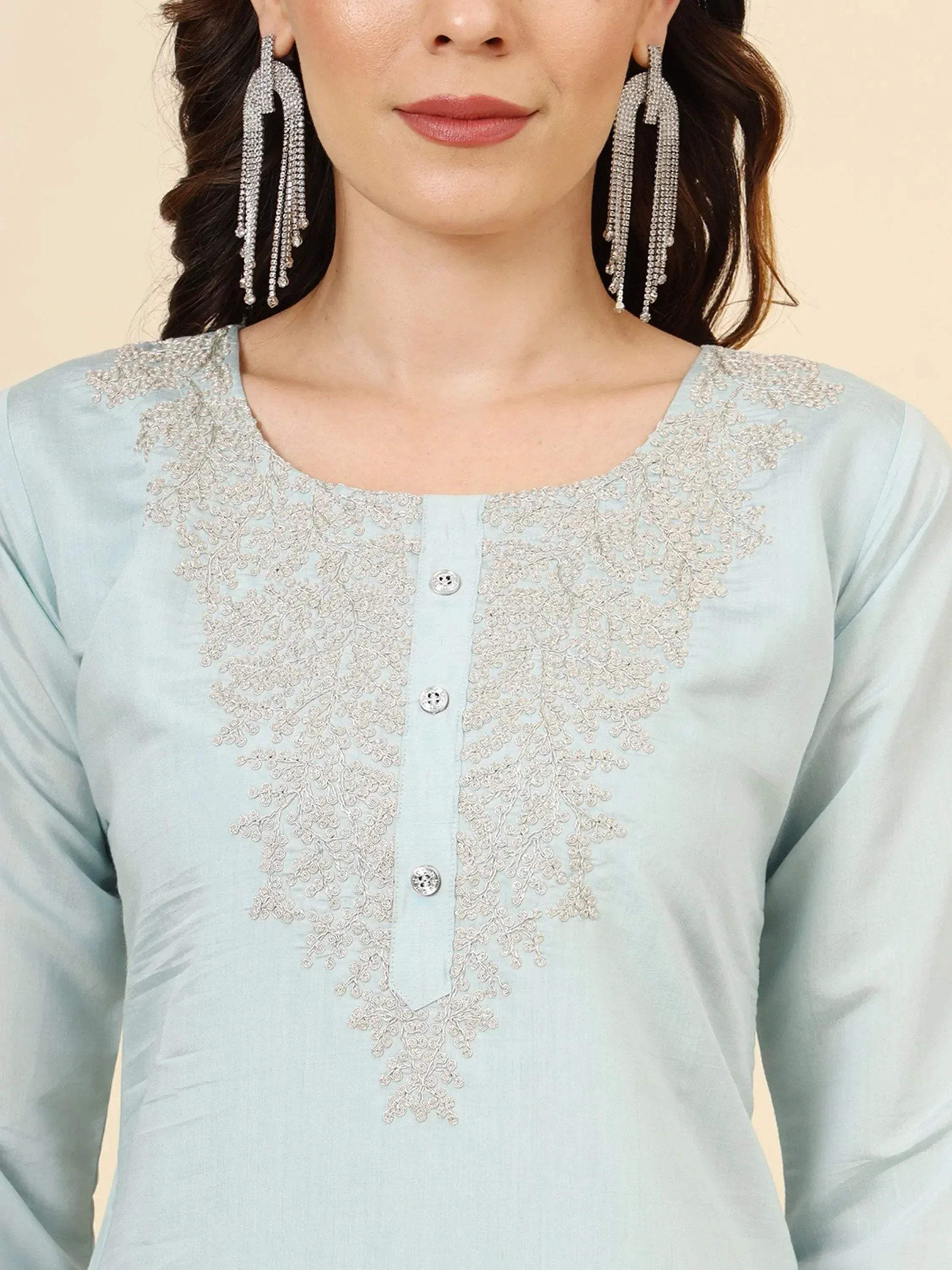 Light blue ethnic kurti with intricate silver embroidery and matching earrings