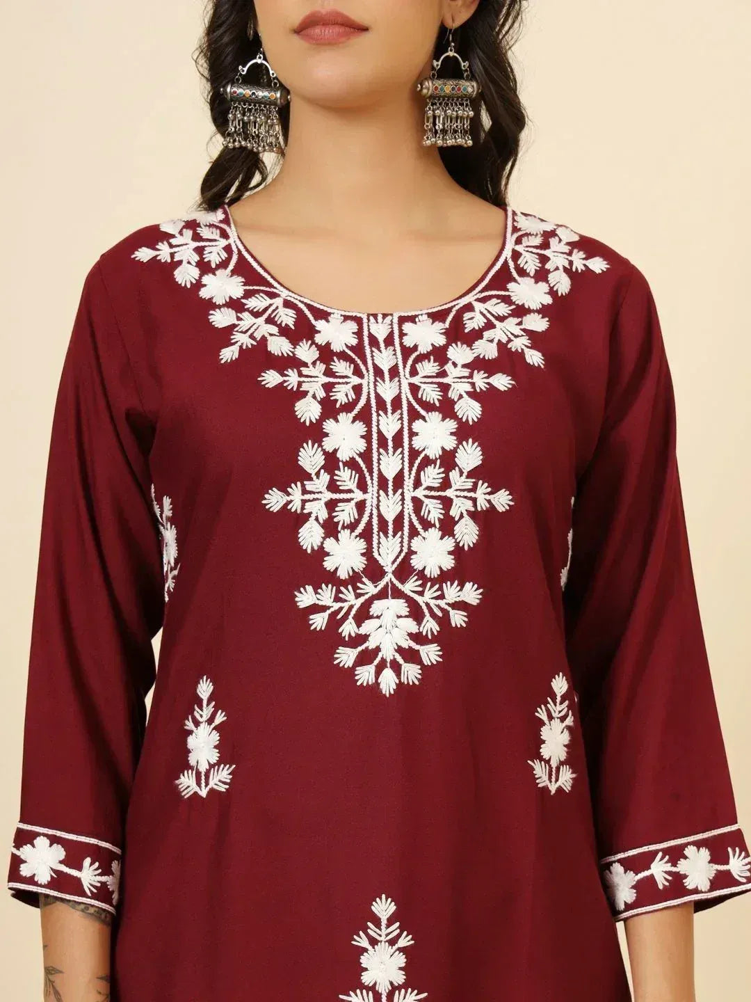 Maroon ethnic kurti with white floral embroidery, perfect for Indian wear