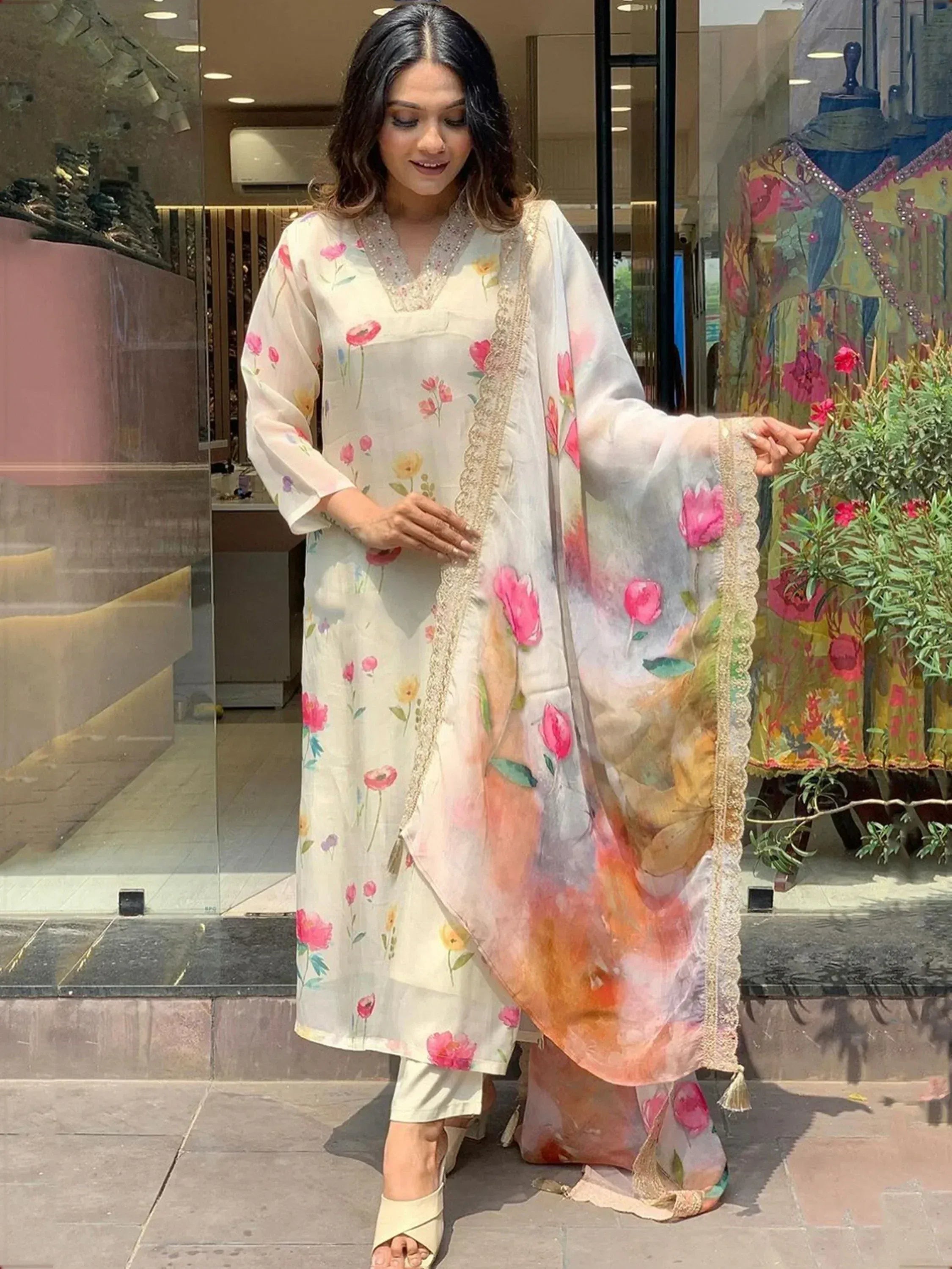 Floral printed ethnic salwar kameez with lace detailing and vibrant dupatta
