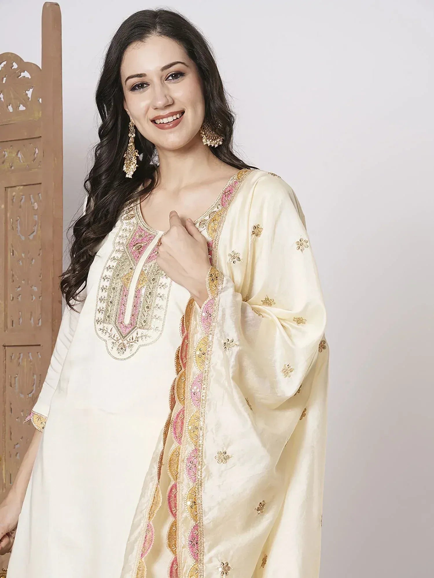 Cream embroidered kurta with pink and gold detailing, paired with matching dupatta, ideal for Indian ethnic wear.