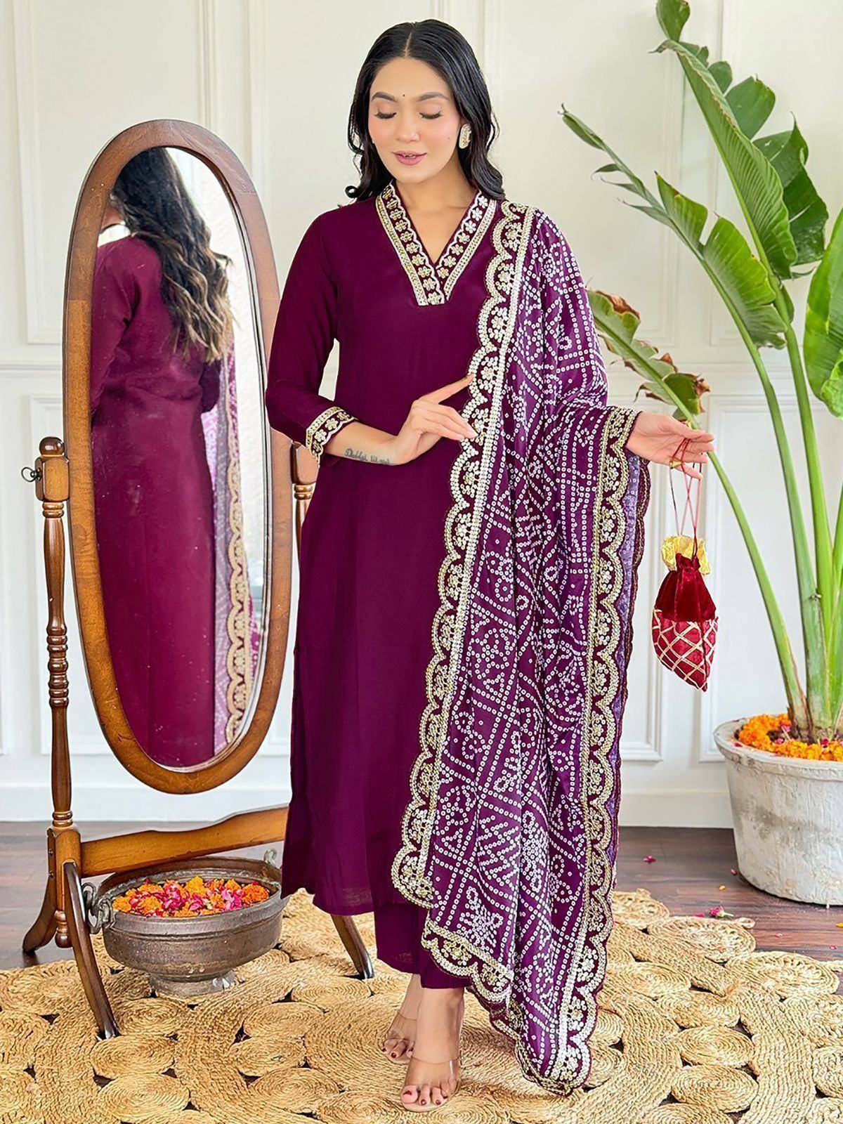 Purple embroidered salwar kameez with matching dupatta, perfect for ethnic occasions and festive wear.