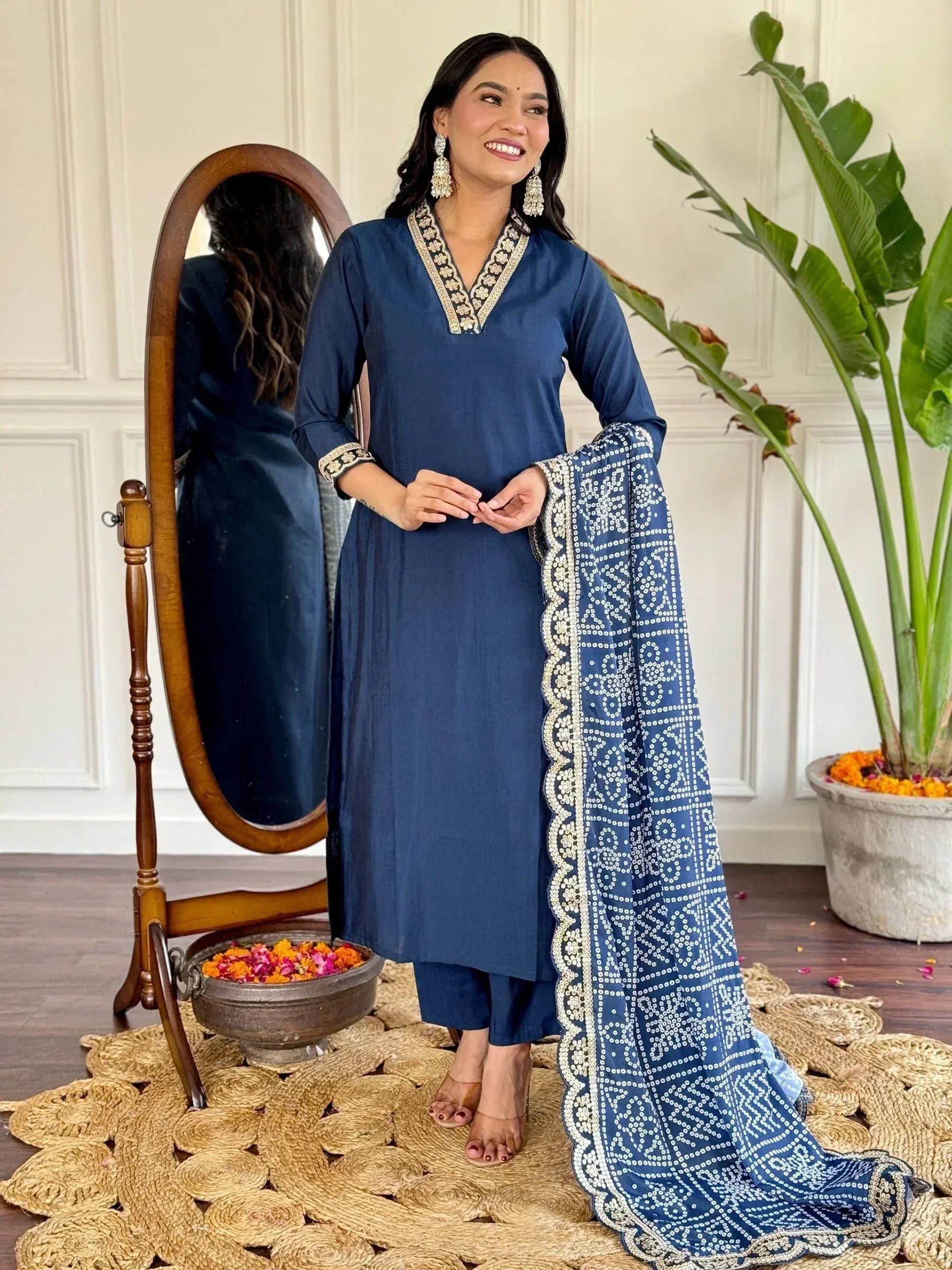 Navy blue ethnic salwar kameez with embroidered neckline and printed dupatta, perfect for Indian occasions