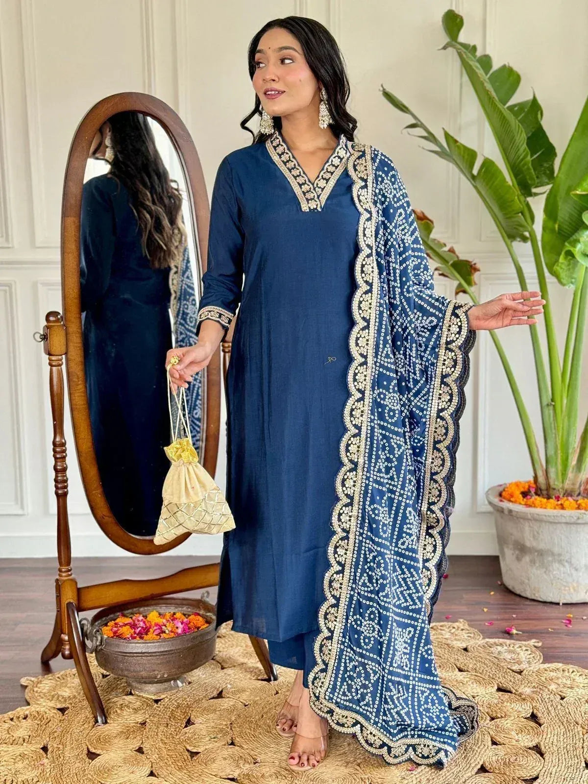 Navy blue ethnic kurta with embroidered dupatta, perfect for Indian occasions and festive wear.